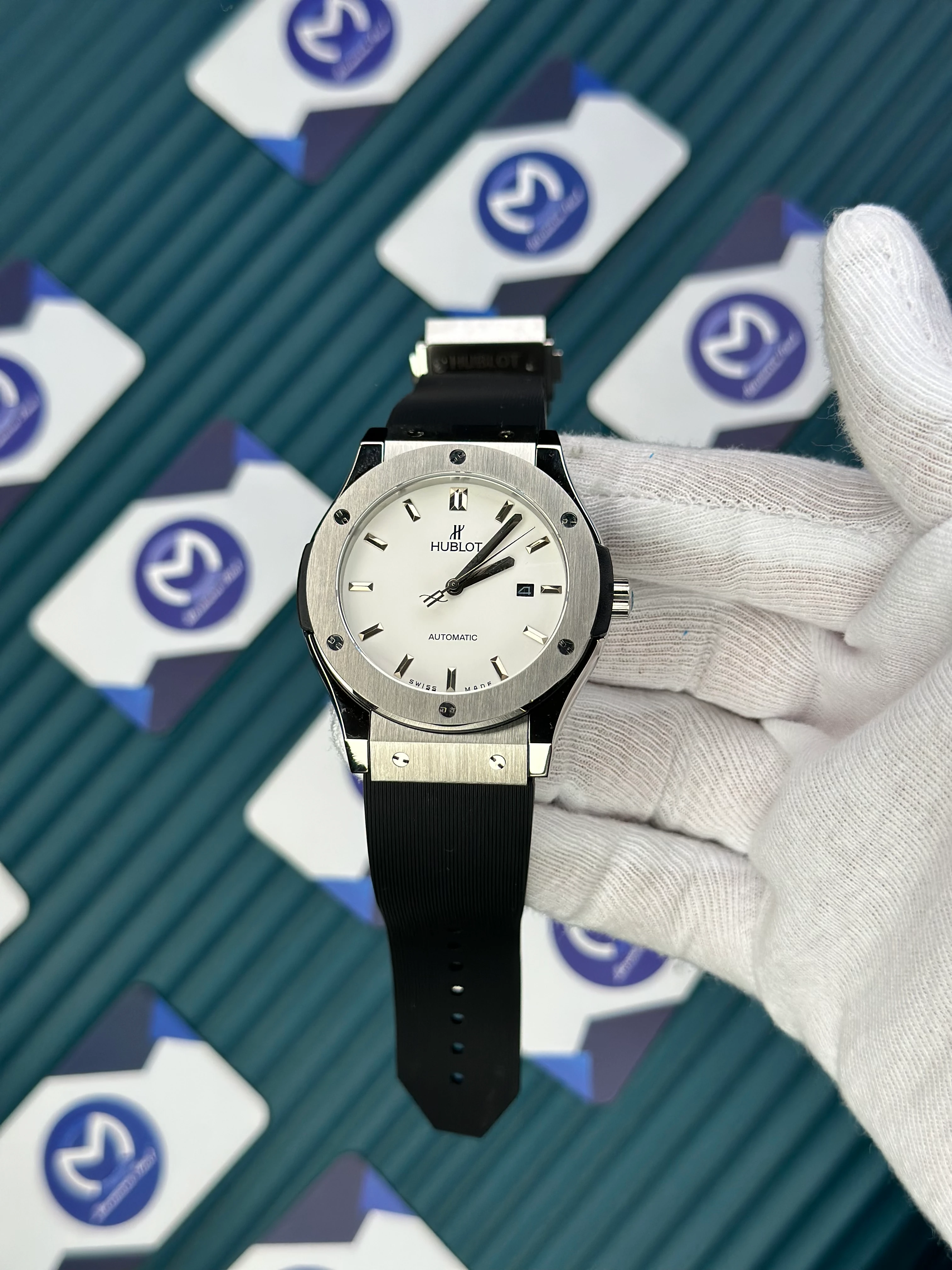 HUBLOT GENEVE AUTOMATIC WHITE DIAL SILVER CASE BLACK RUBBER CORD 