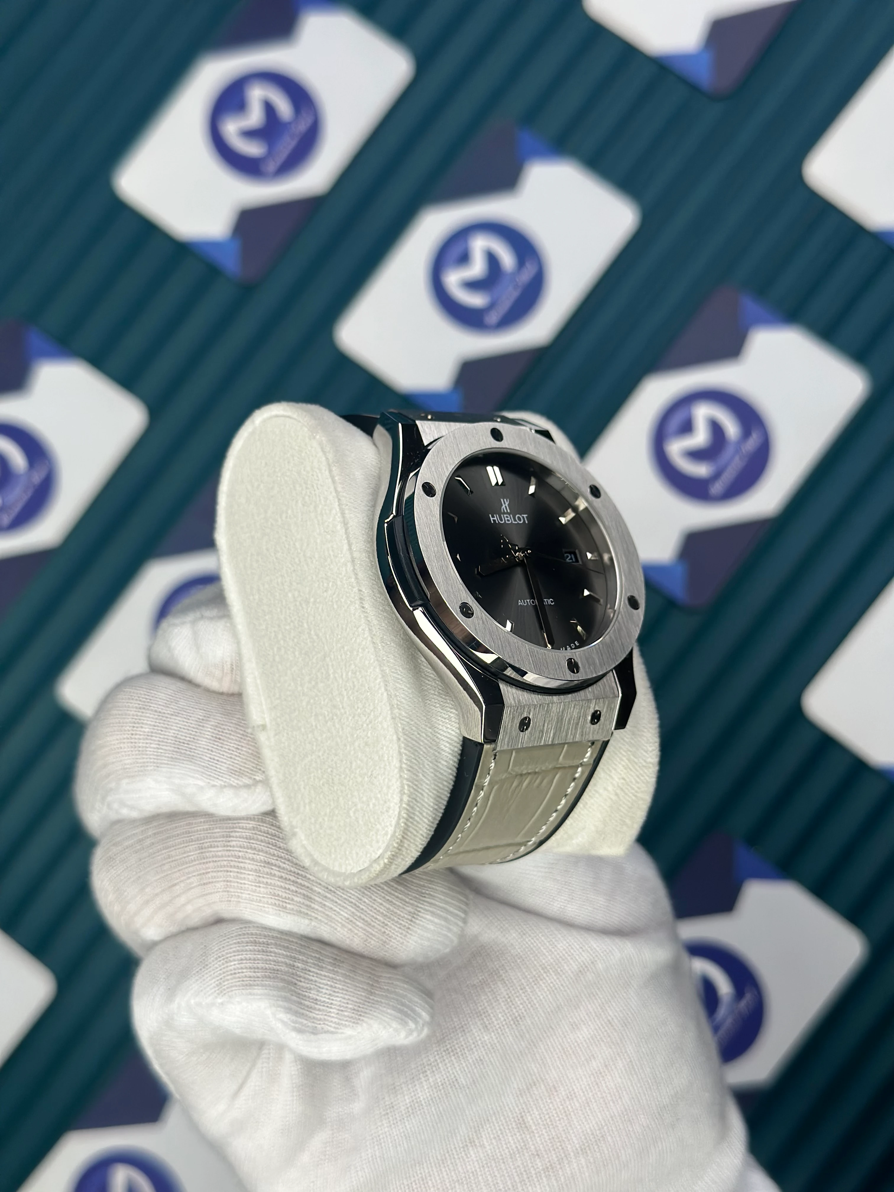 HUBLOT GENEVE AUTOMATIC NAVY GREY DIAL AND CASE GREY LEATHER CORD 