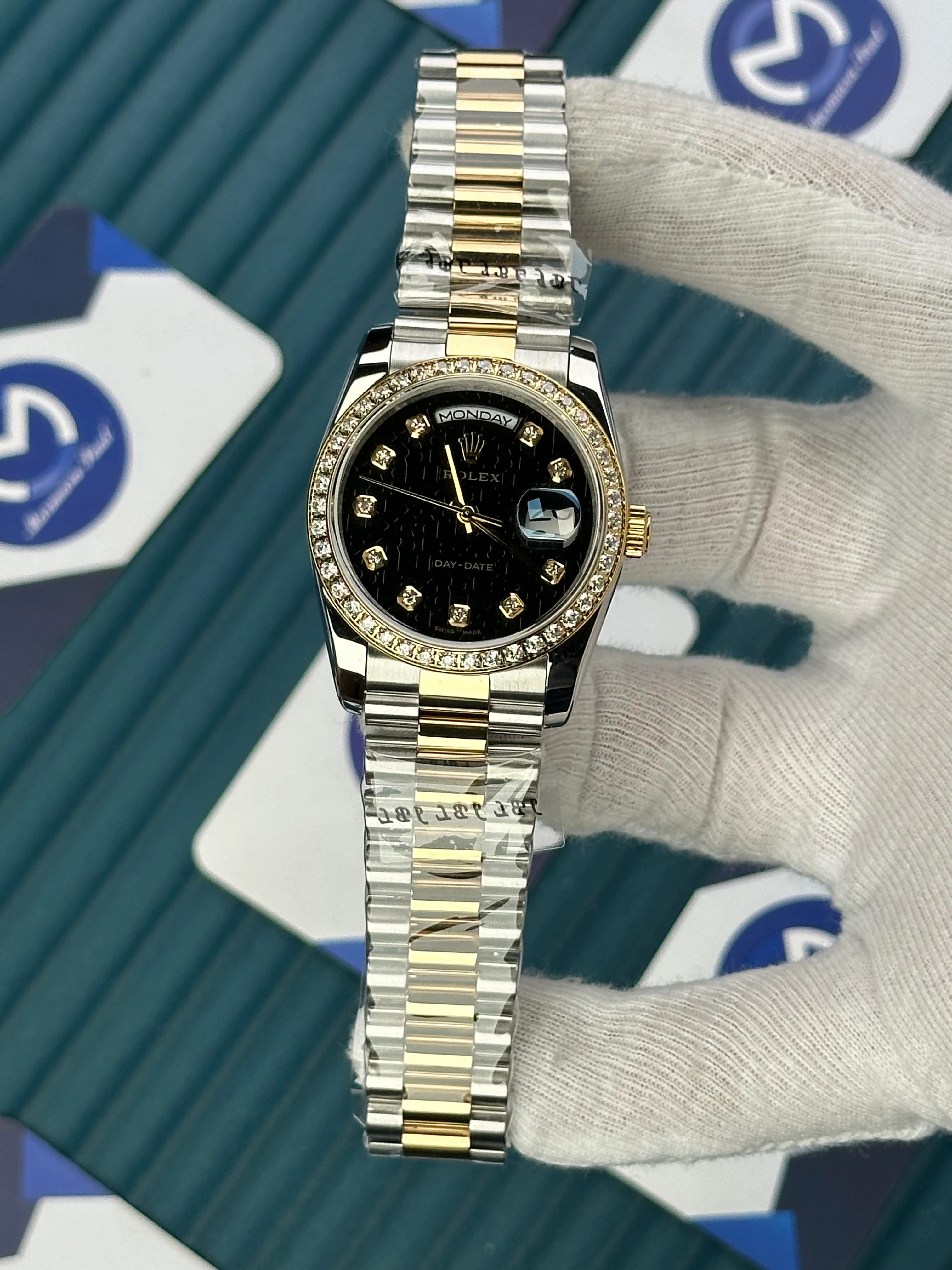 ROLEX 36 MM DAY-DATE BLACK PATTERNED DIAL DIAMOND INDEX AND BEZEL GOLD-SILVER PREIDENT 