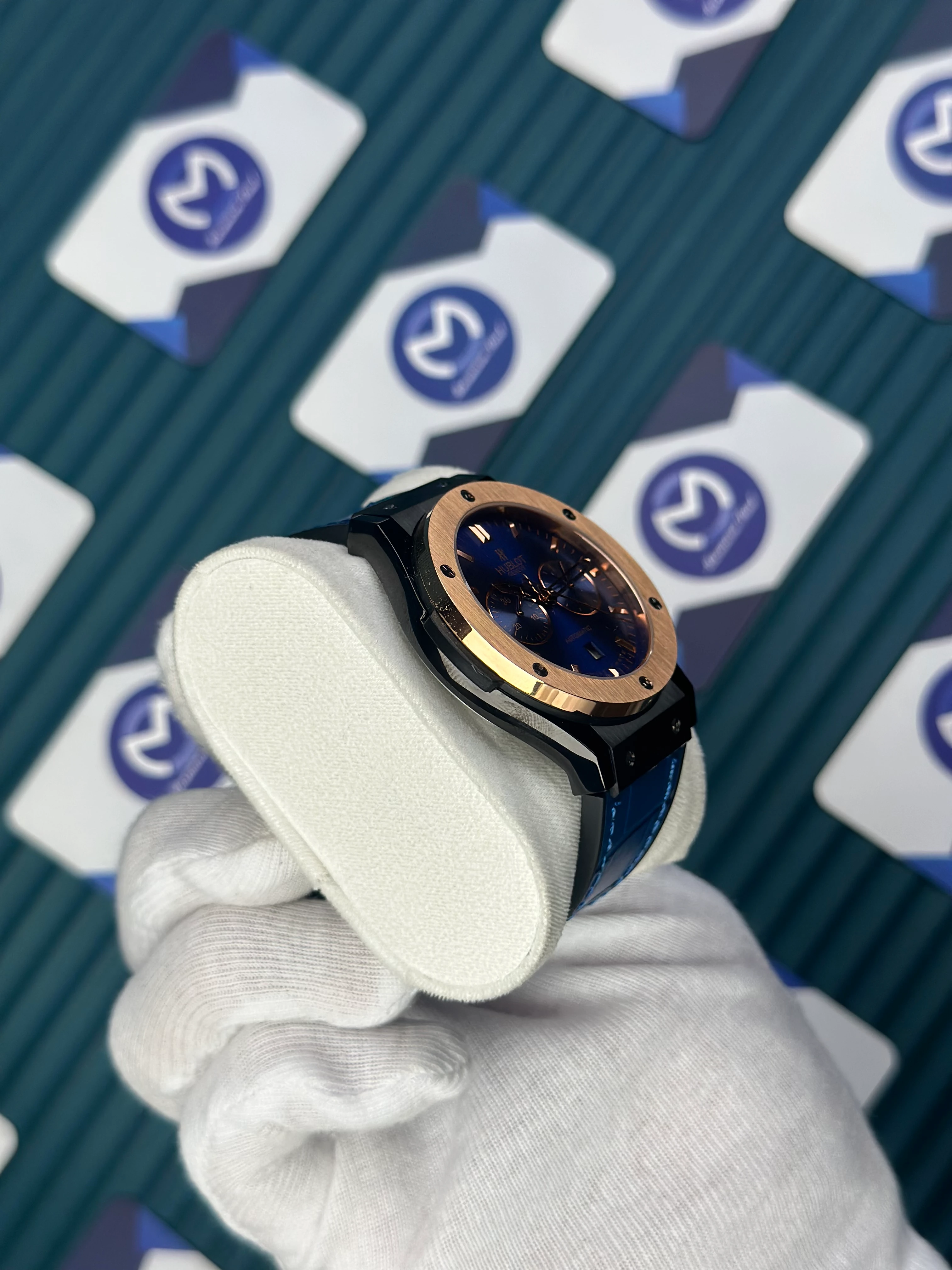 HUBLOT AUTOMATIC NAVY BLUE CHRONOGRAPH ROSE CASE BLACK CASE BLUE LEATHER CORD 