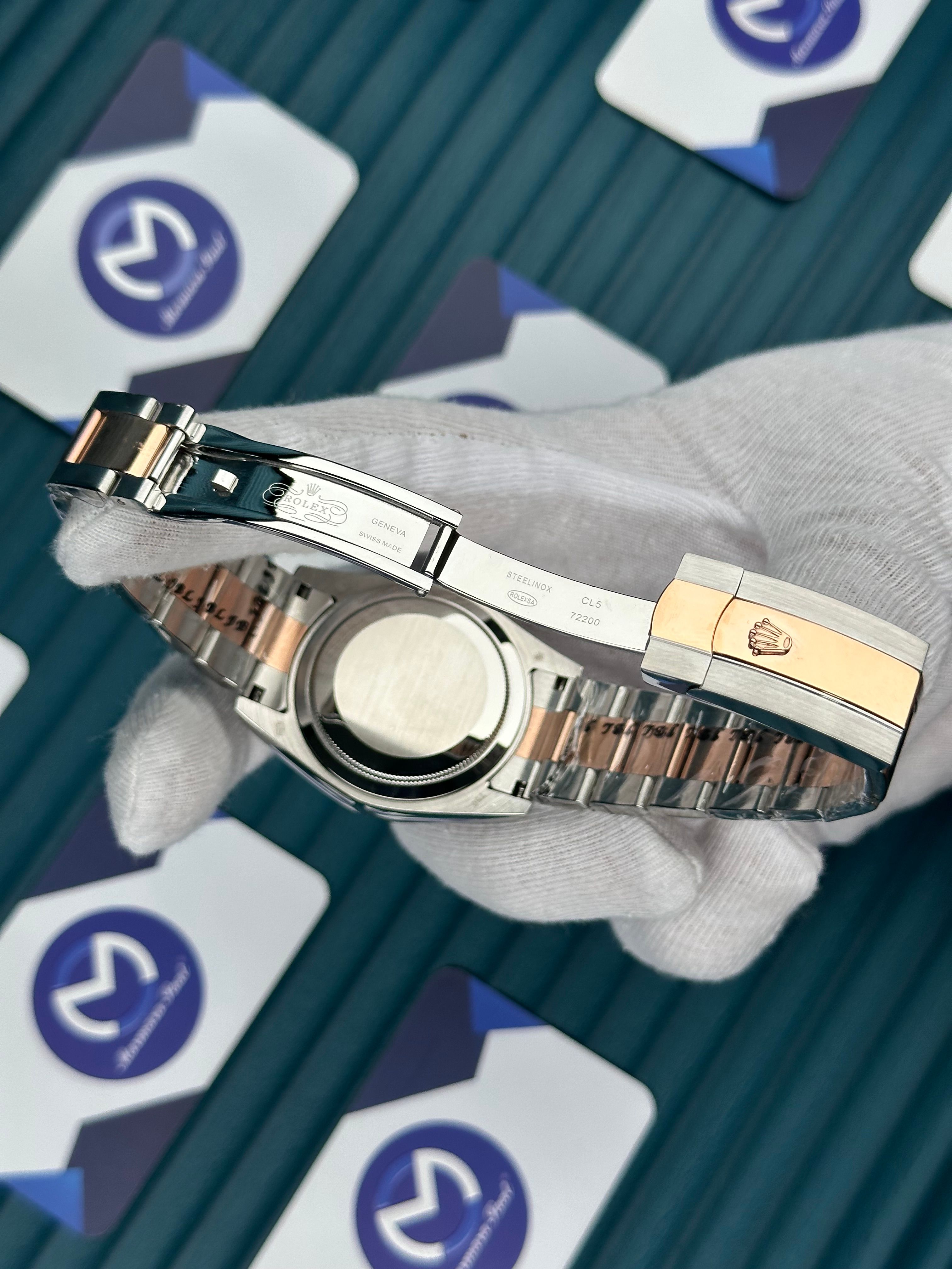 ROLEX DATEJUST OVAL BEZEL CHAMPAGNE DIAL ROSE-SILVER OYSTER