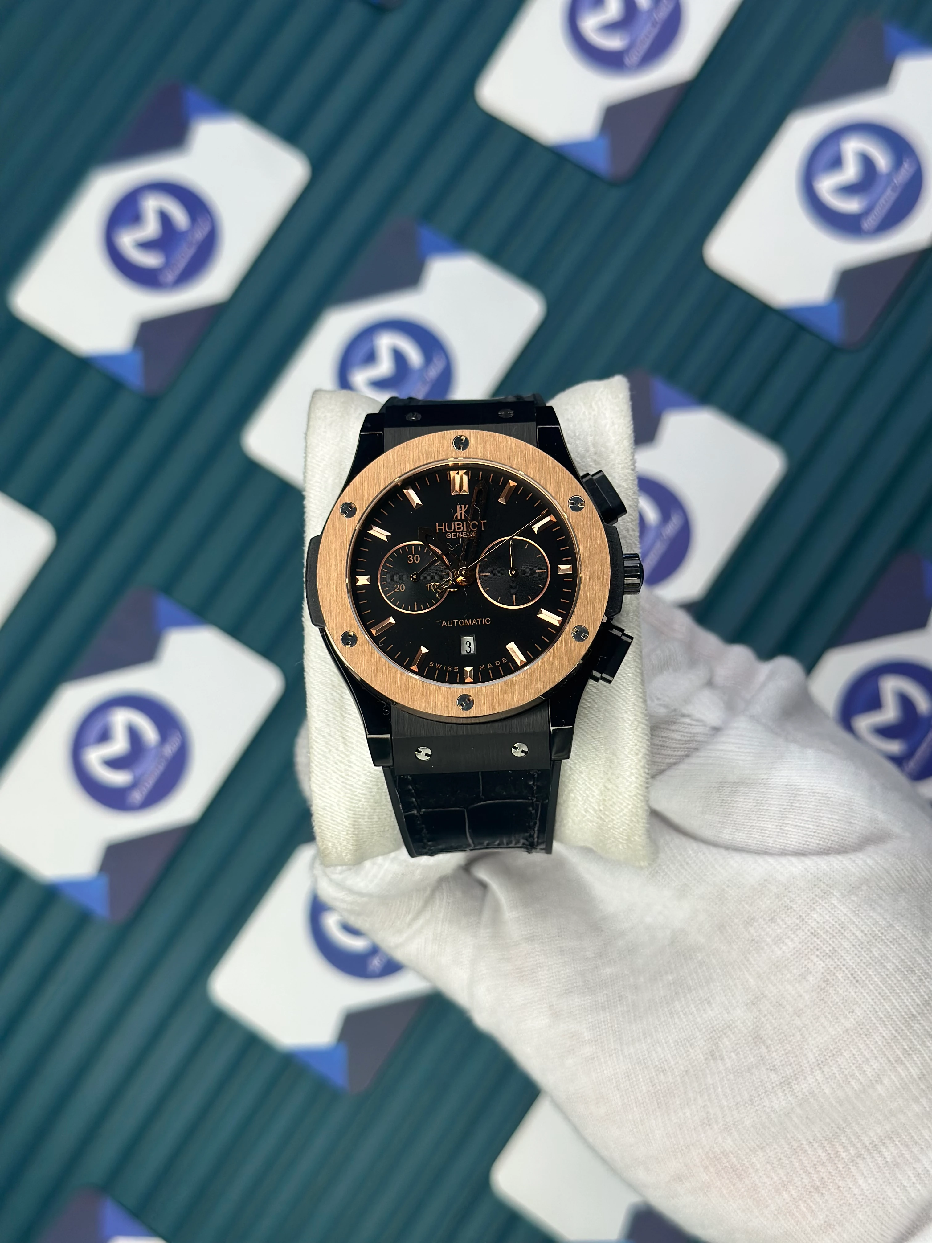 HUBLOT AUTOMATIC BLACK CHRONOGRAPH DIAL ROSE CASE BLACK CASE BLACK LEATHER CORD 