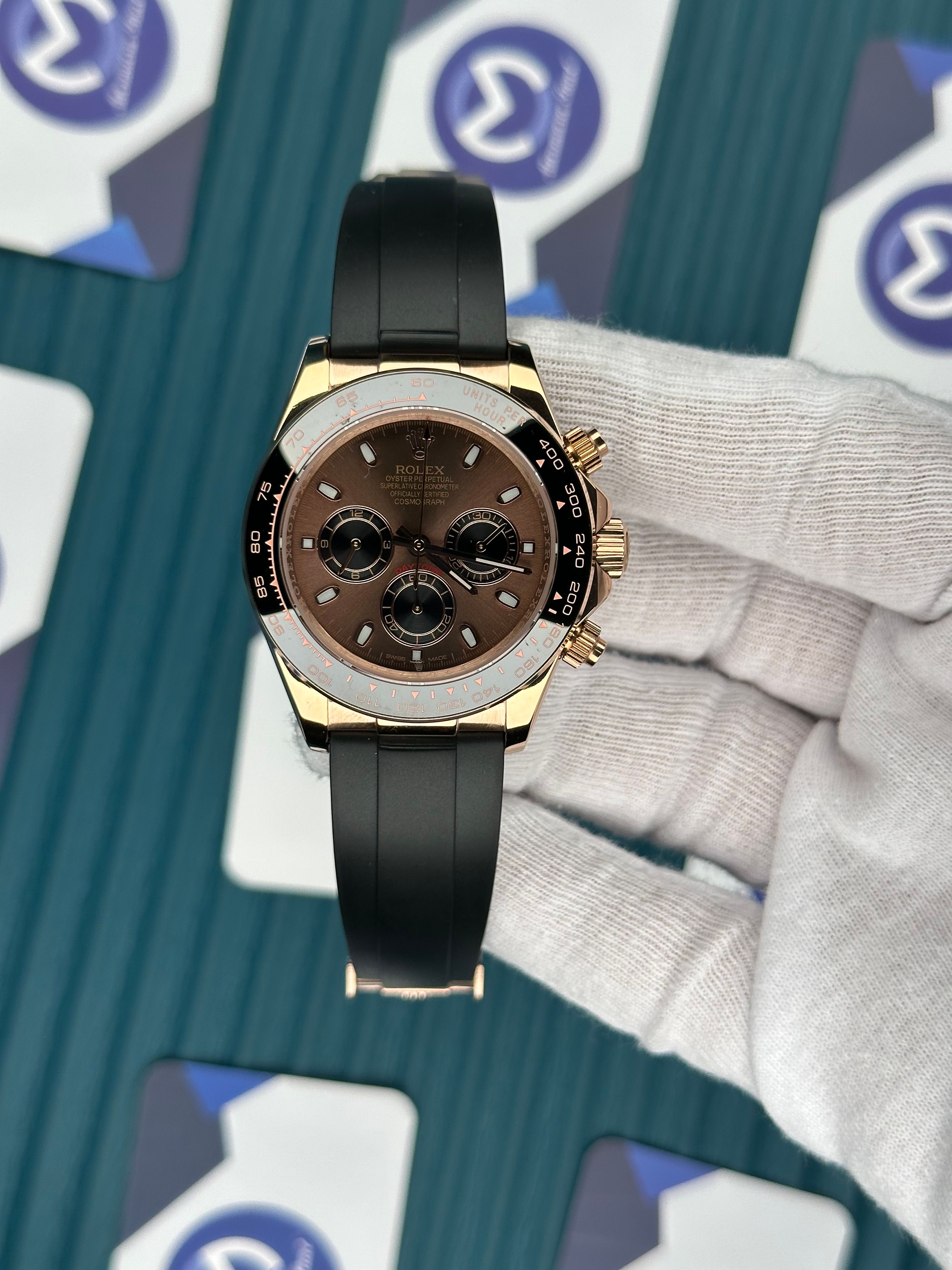 ROLEX DAYTONA BROWN DIAL ROSE CASE BLACK OYSTERFLEX