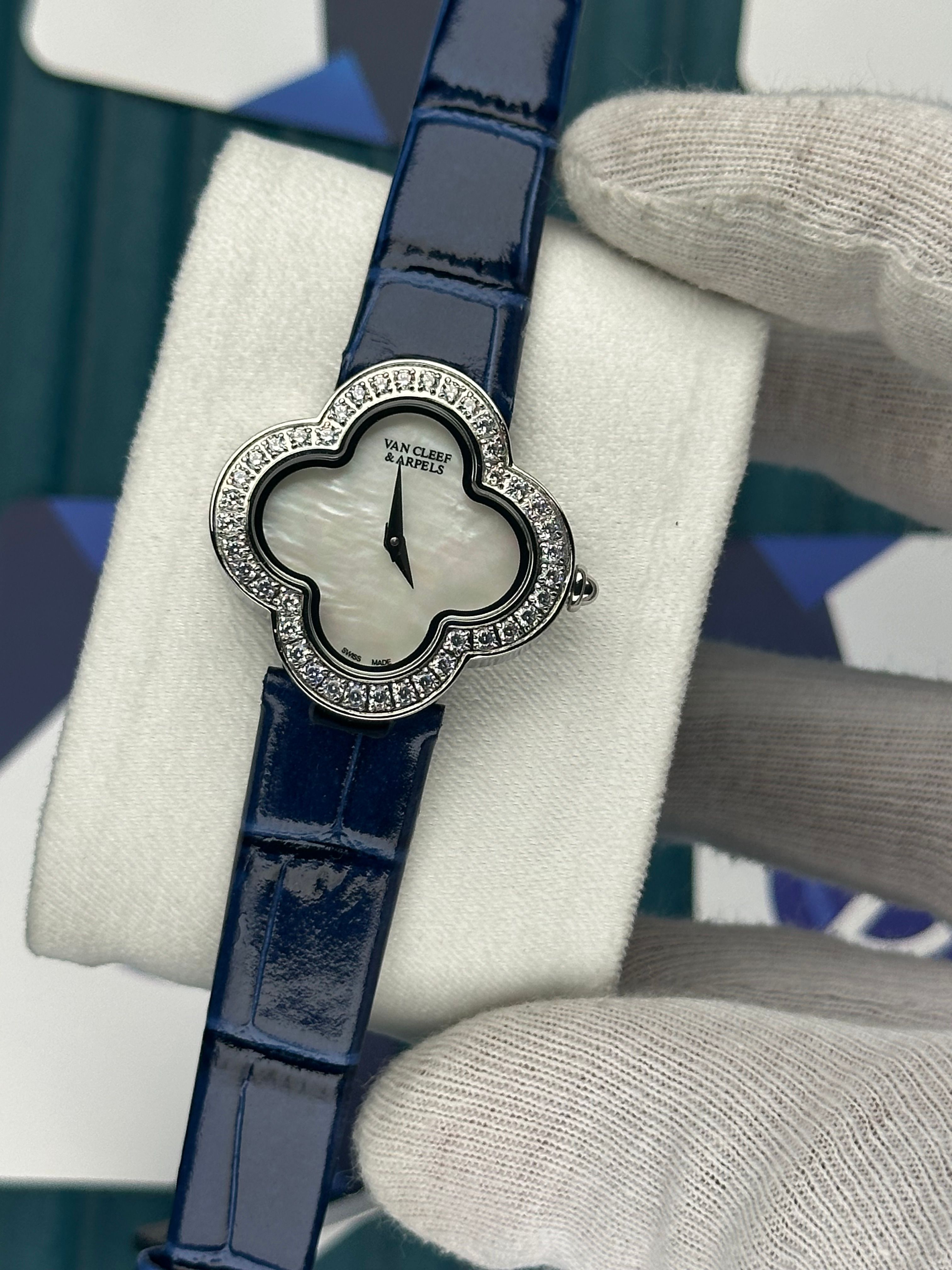 VAN CLEEF & ARPELS WHITE DIAL DIAMOND BEZEL SILVER CASE BLUE LEATHER CORD