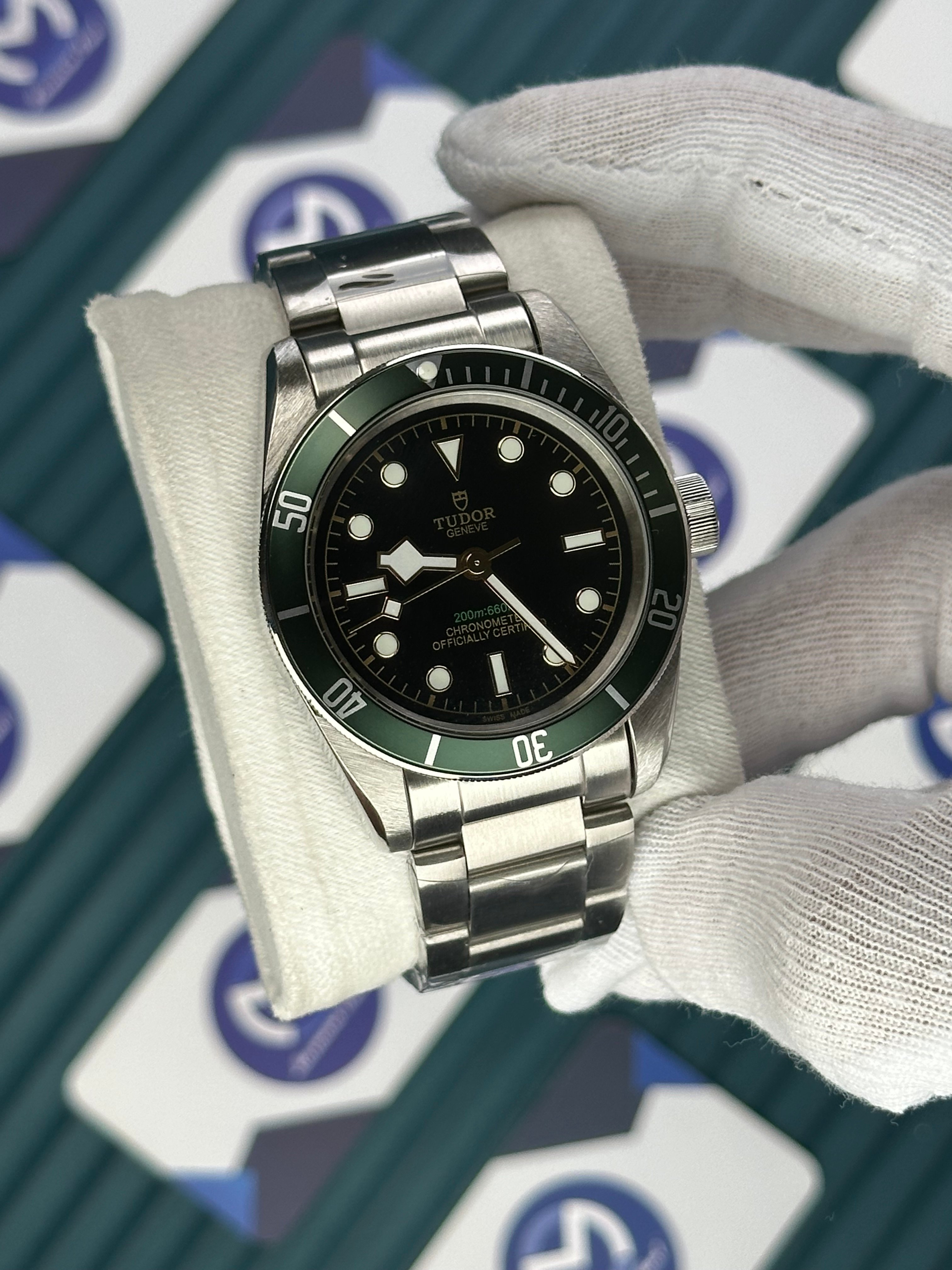 TUDOR BLACK DIAL GREEN BEZEL SILVER