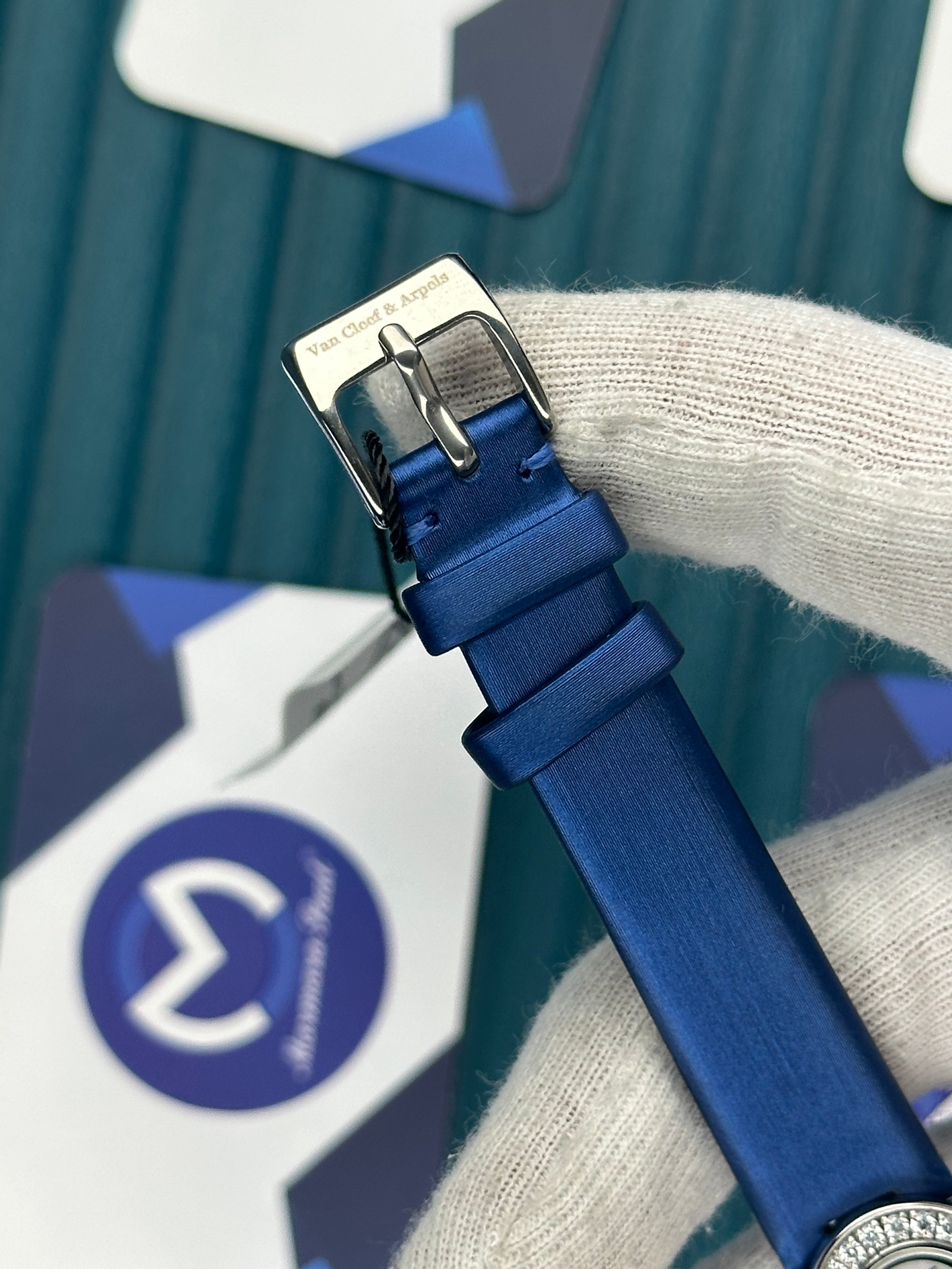 VAN CLEEF & ARPELS WHITE DIAL SILVER CASE BLUE LEATHER CORD