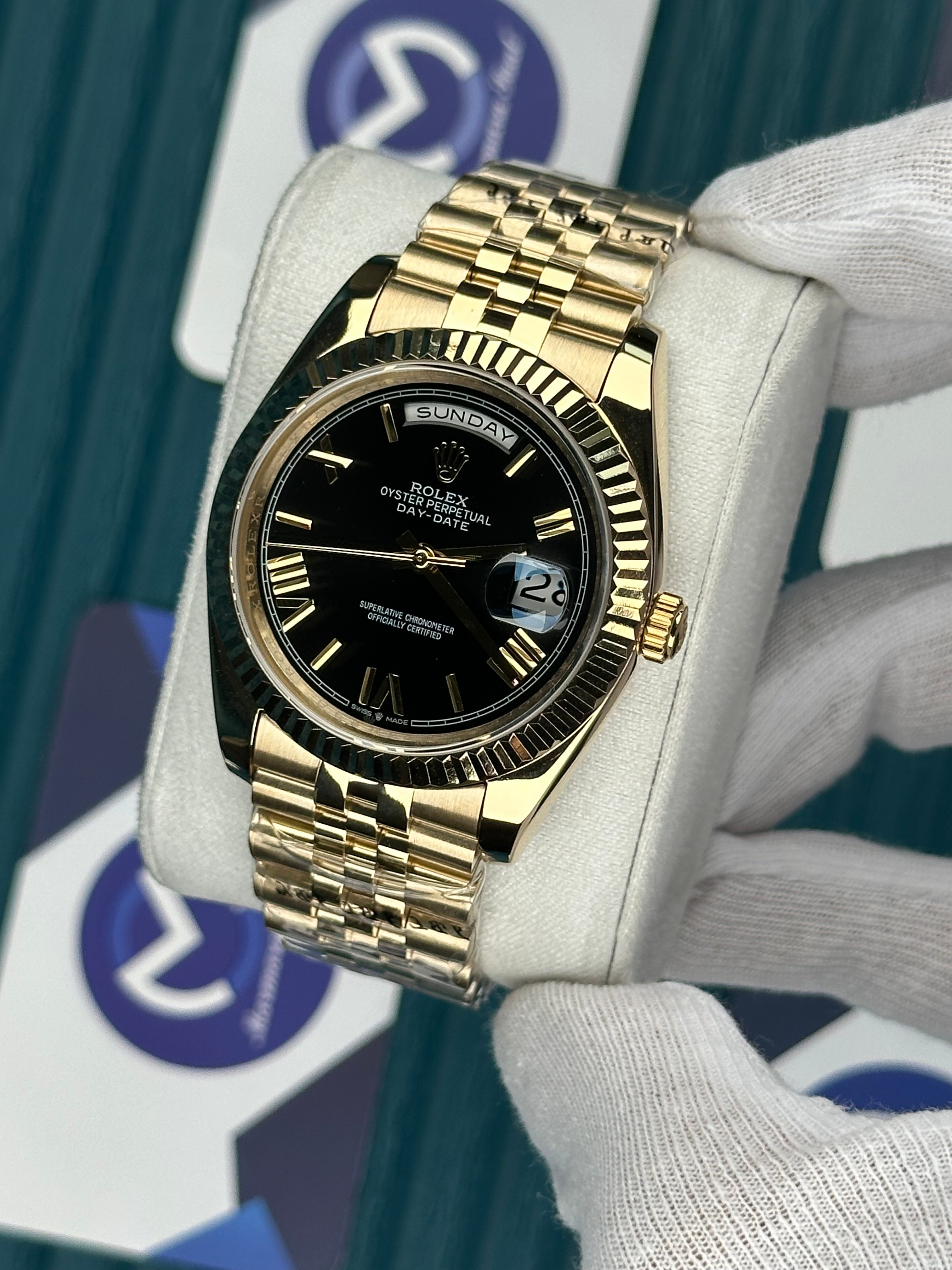 ROLEX DAY-DATE BLACK DIAL GOLD ROMA INDEX GOLD JUBILE
