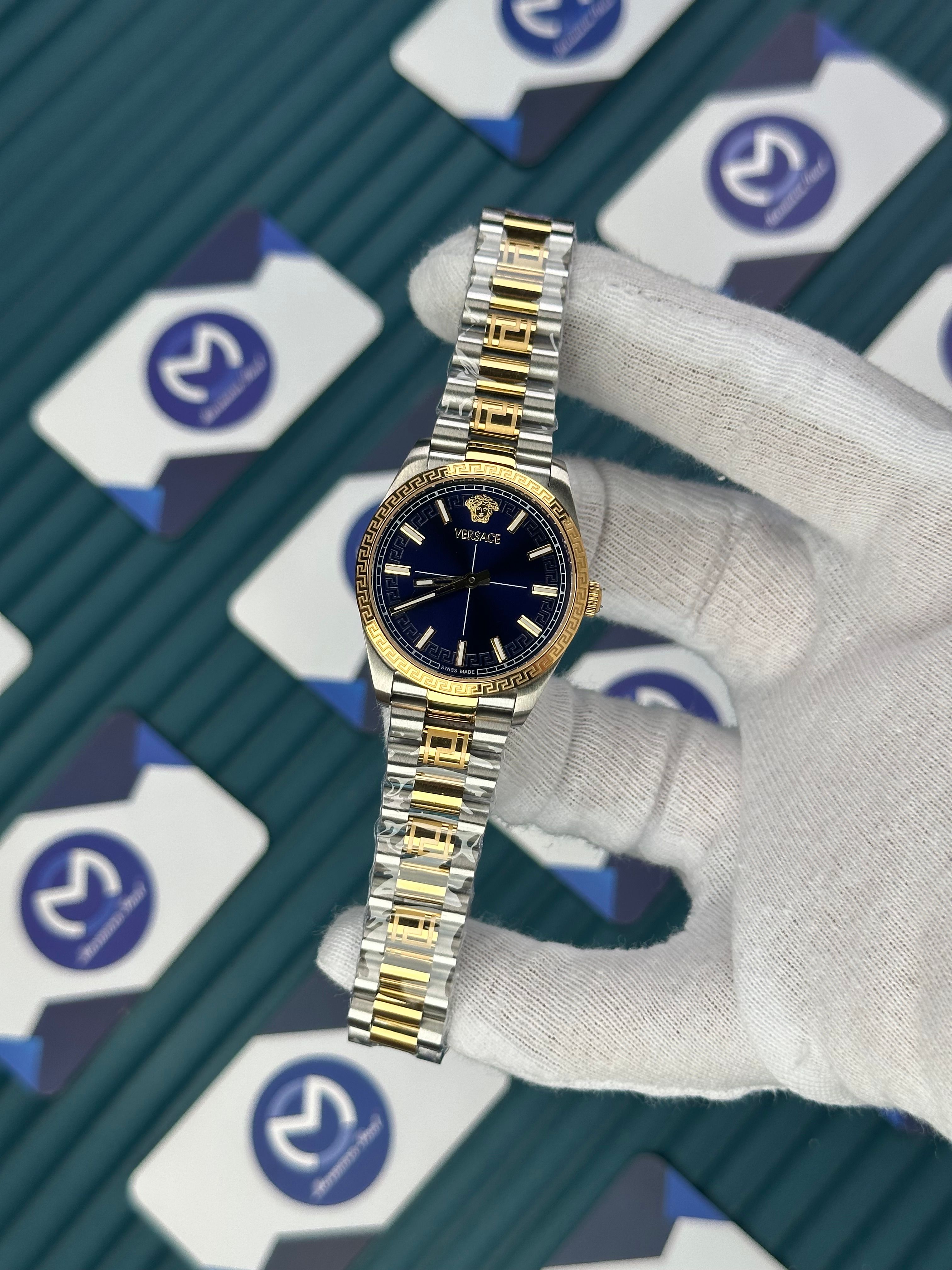VERSACE 32 MM BLUE DIAL MILLENYIUM GENT GOLD-SILVER