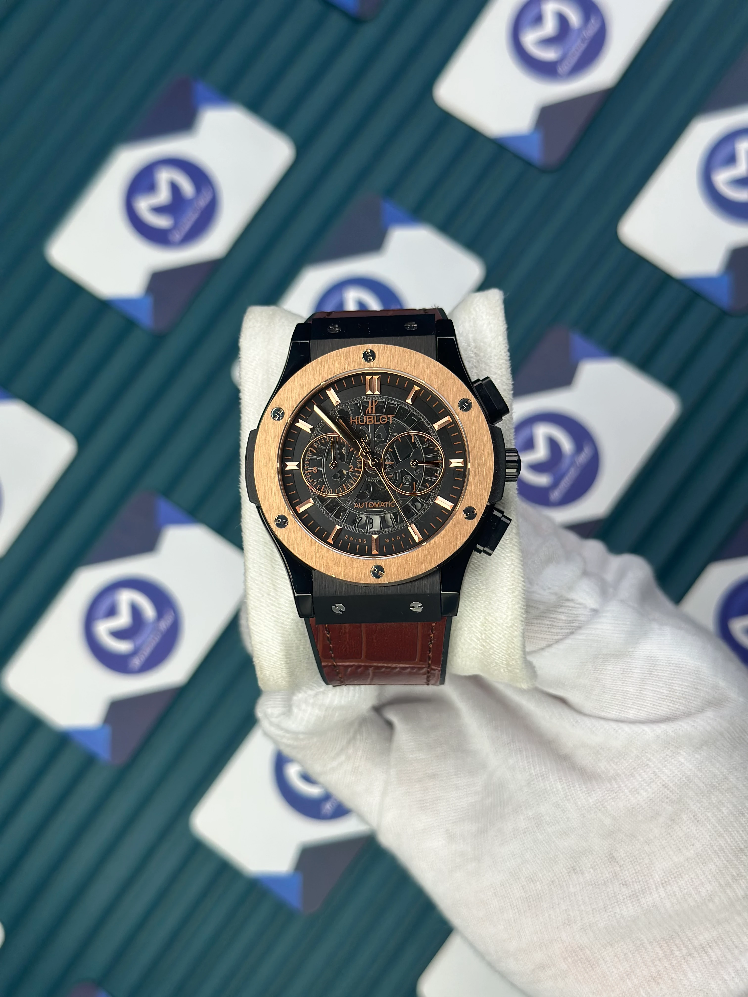 HUBLOT AUTOMATIC SKELETON DIAL ROSE BEZEL BLACK CASE BROWN LEATHER CORD 