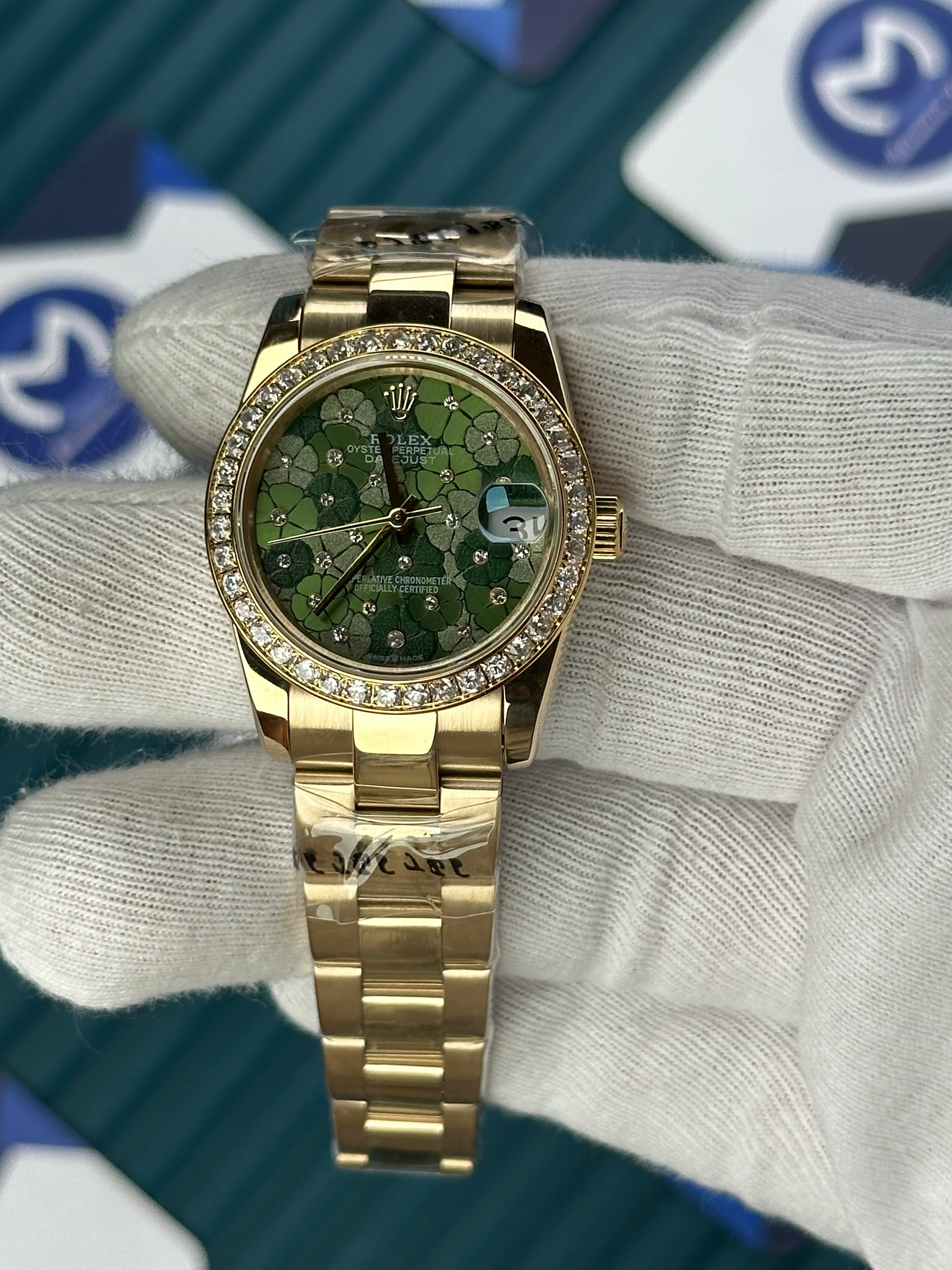 ROLEX 31 MM DATEJUST GREEN FLOWERS PATTERNED DIAL DIAMOND BEZEL GOLD OYSTER 