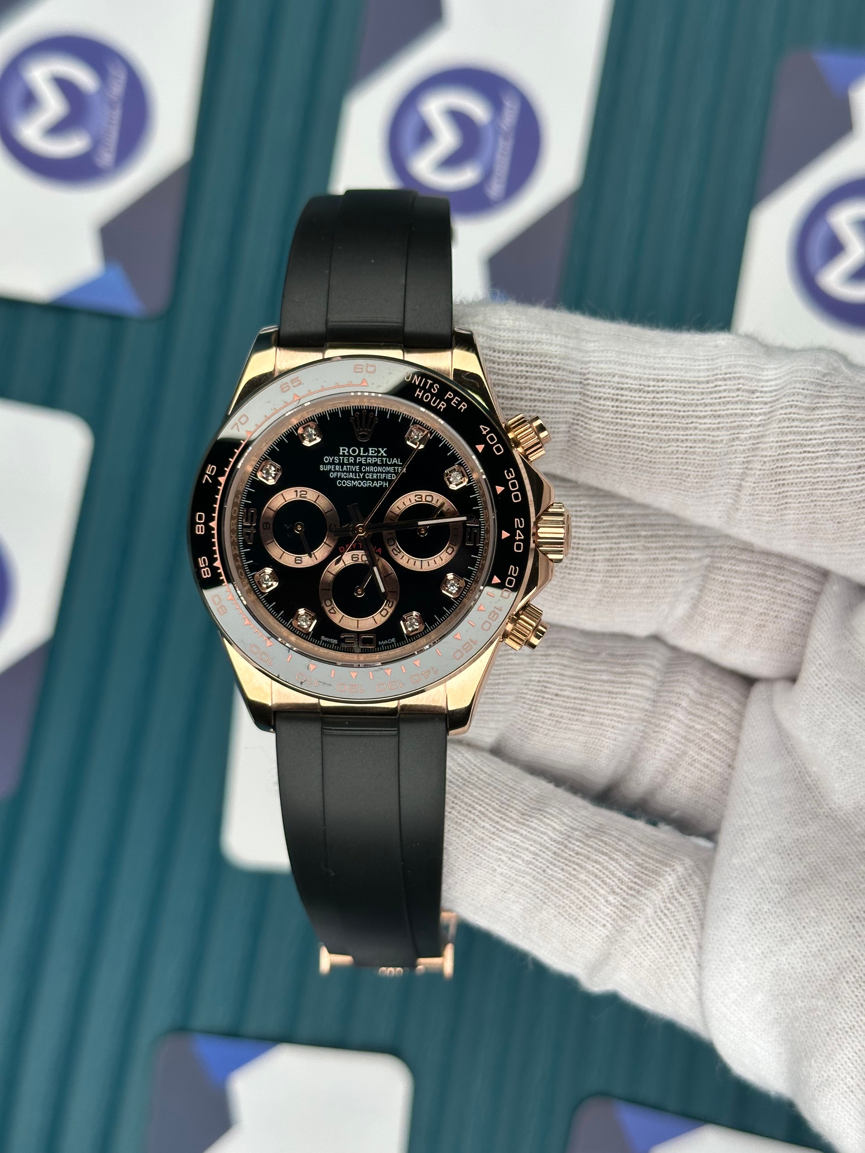 ROLEX DAYTONA BLACK DIAL DIAMOND INDEX ROSE CASE OYSTERFLEX