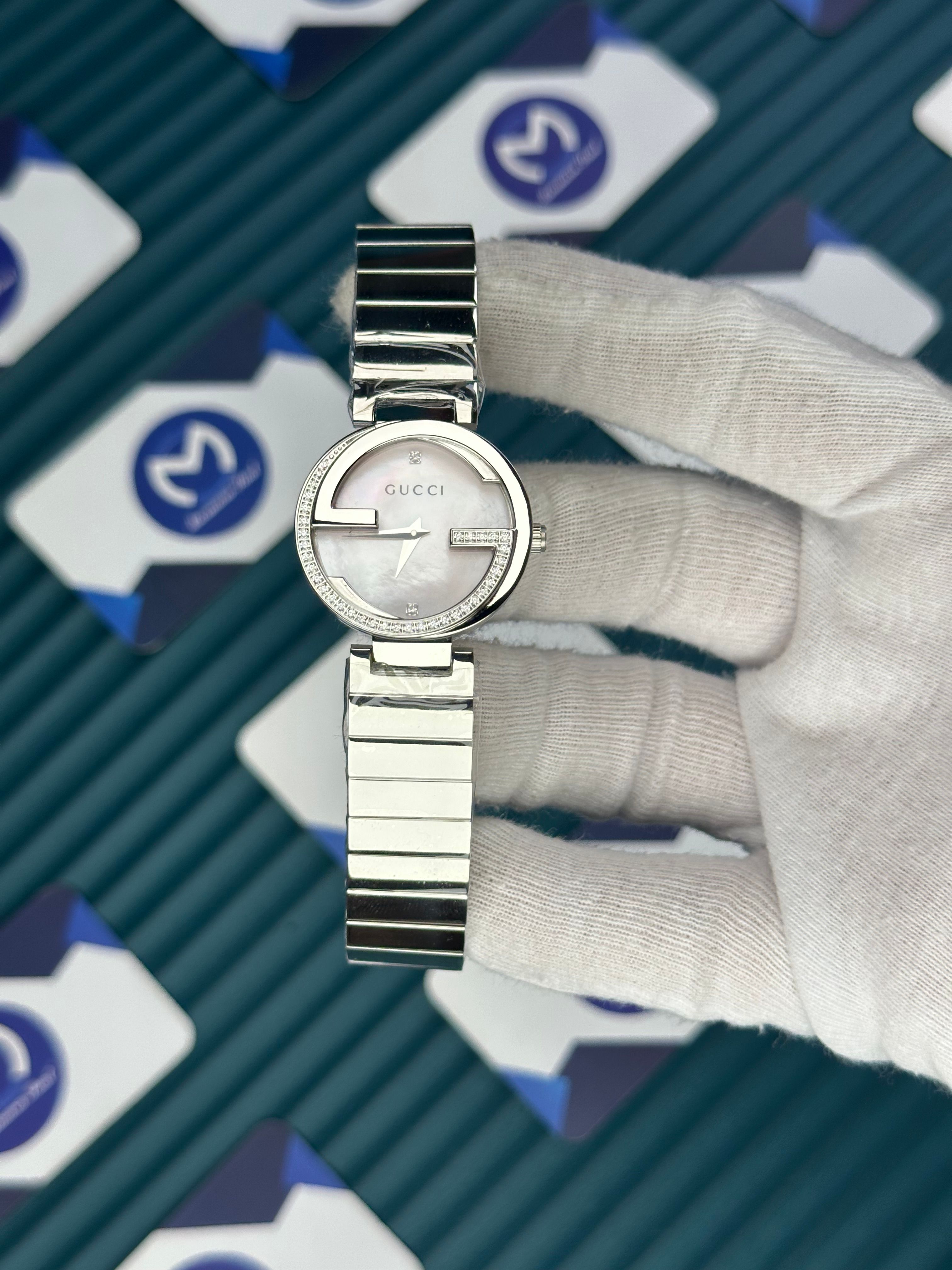 GUCCI WOMAN PINK DIAL G CASAE DIAMOND DIAL SILVER CORD