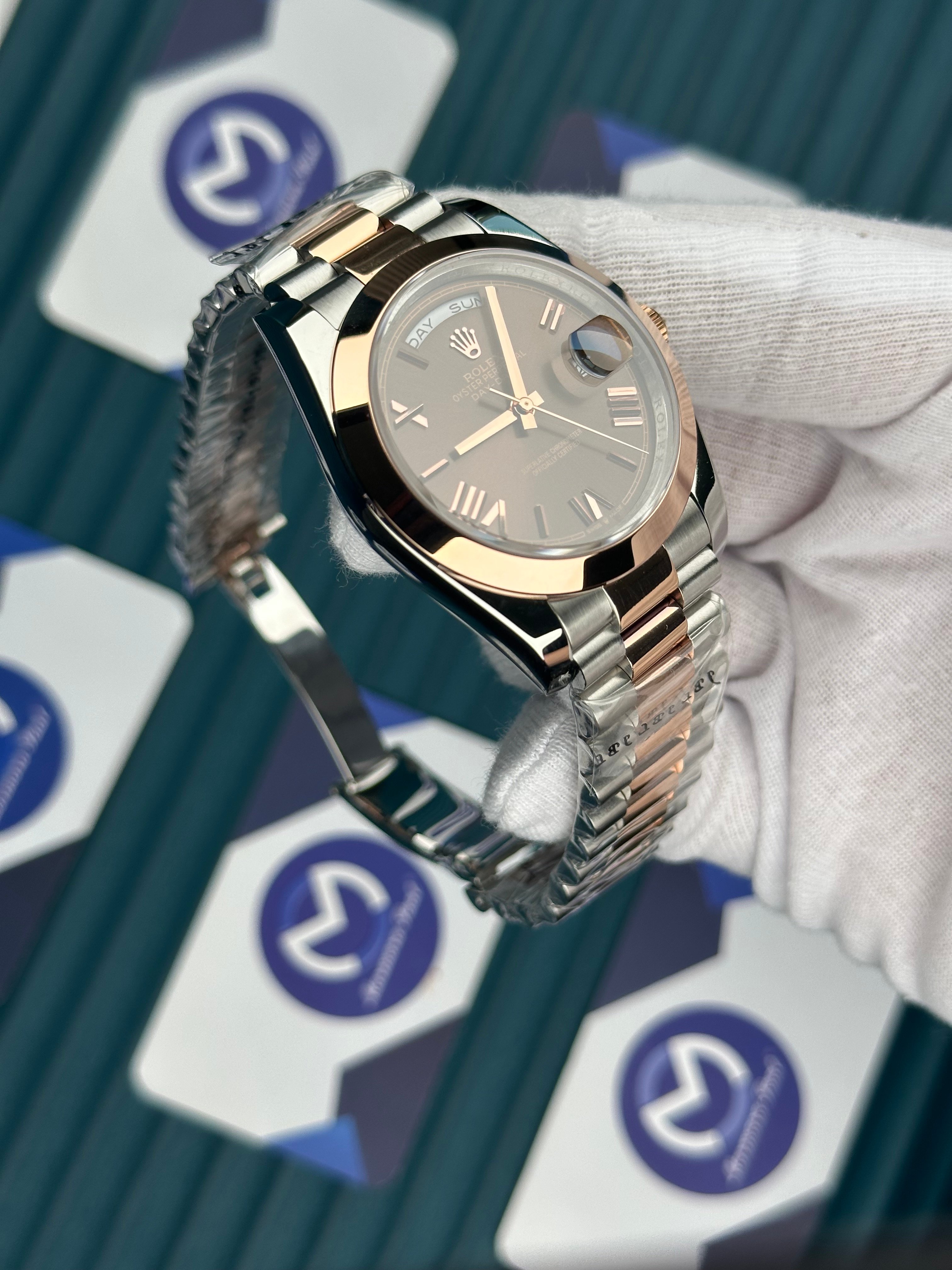 ROLEX DAY-DATE CHOCOLATE OVAL BEZEL ROSE-SILVER PRESIDENT
