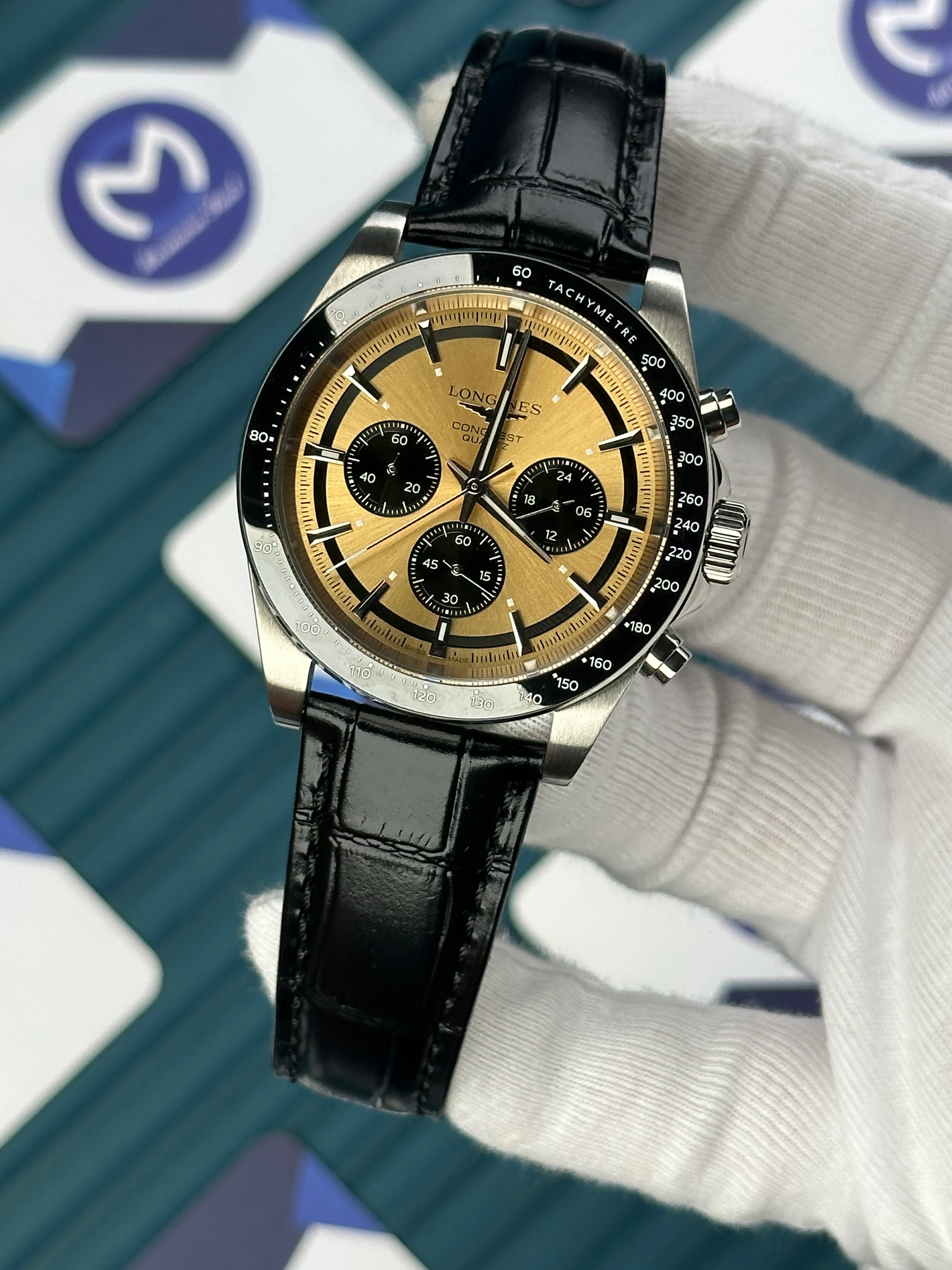 LONGINES CONQUEST CHRONOGRAPH AUTOMATIC GOLD REFLECTED DAYLIGHT DIAL BLACK LEATHER 