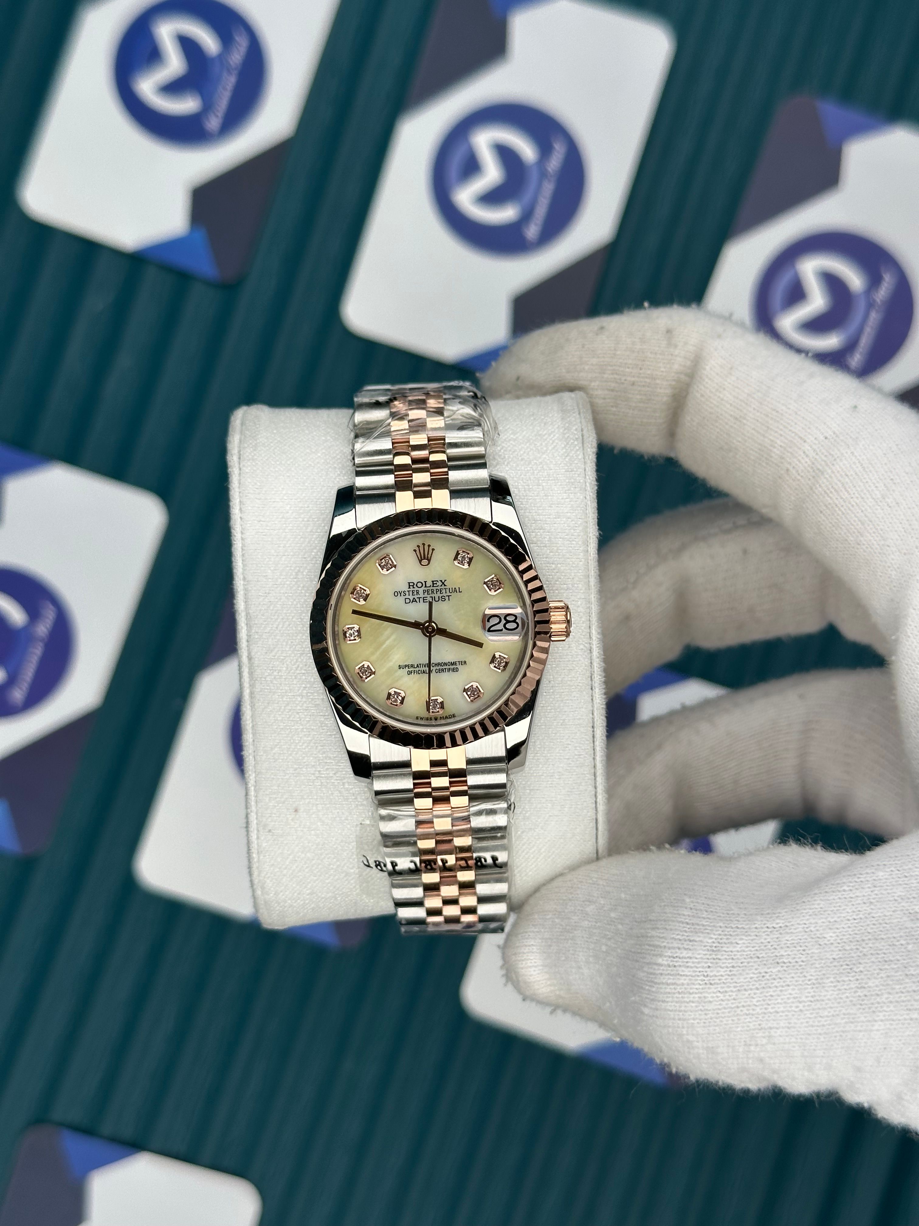 ROLEX 31 CHAMPAGNE DIAL ROSE-SILVER JUBILEE