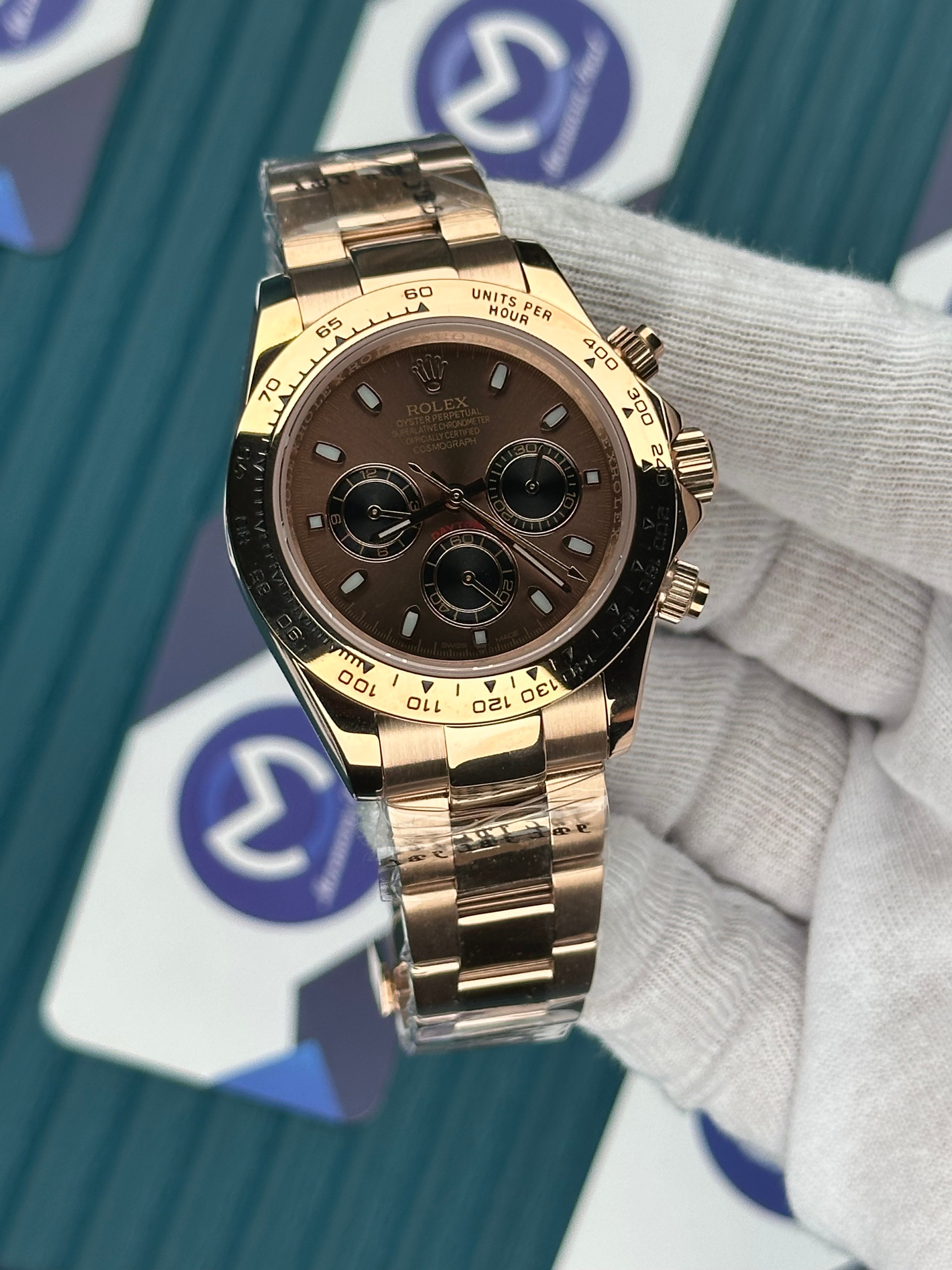 ROLEX DAYTONA BROWN DIAL ROSE OYSTER