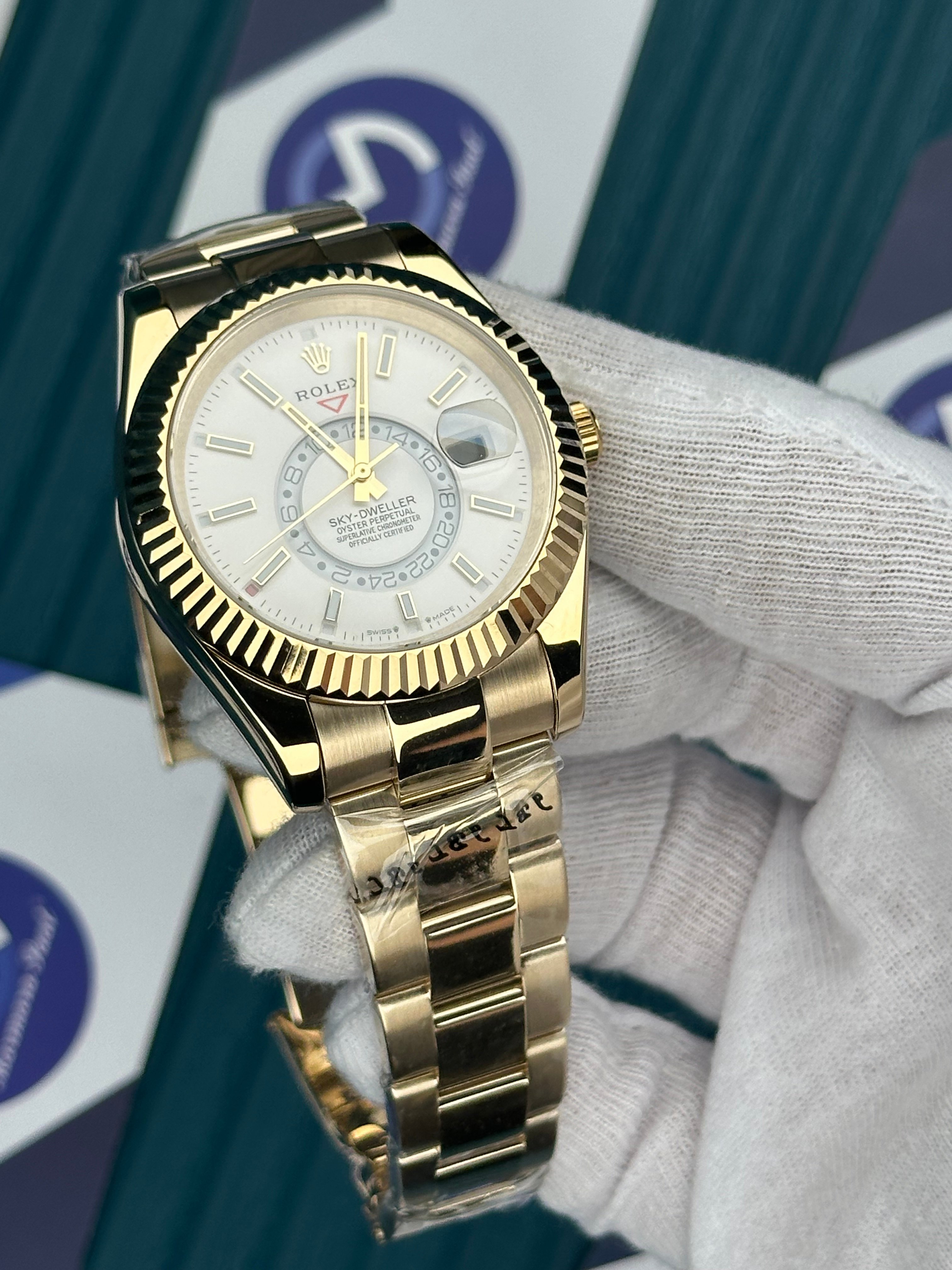 ROLEX SKY-DWELLER WHITE DIAL GOLD OYSTER