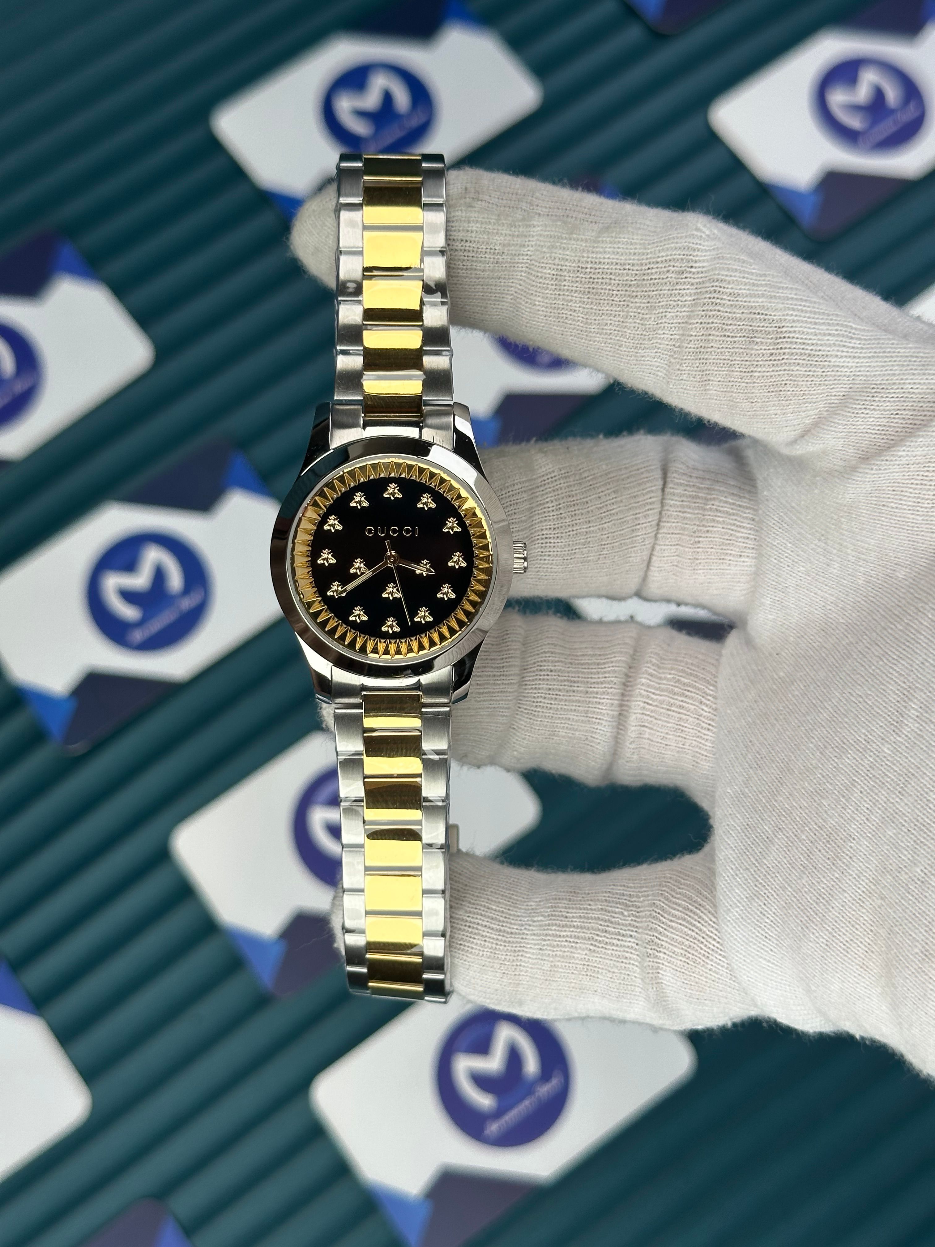GUCCI WOMAN BLACK DIAL GOLD DETAILS BUTTERFLY MOTIF GOLD-SILVER