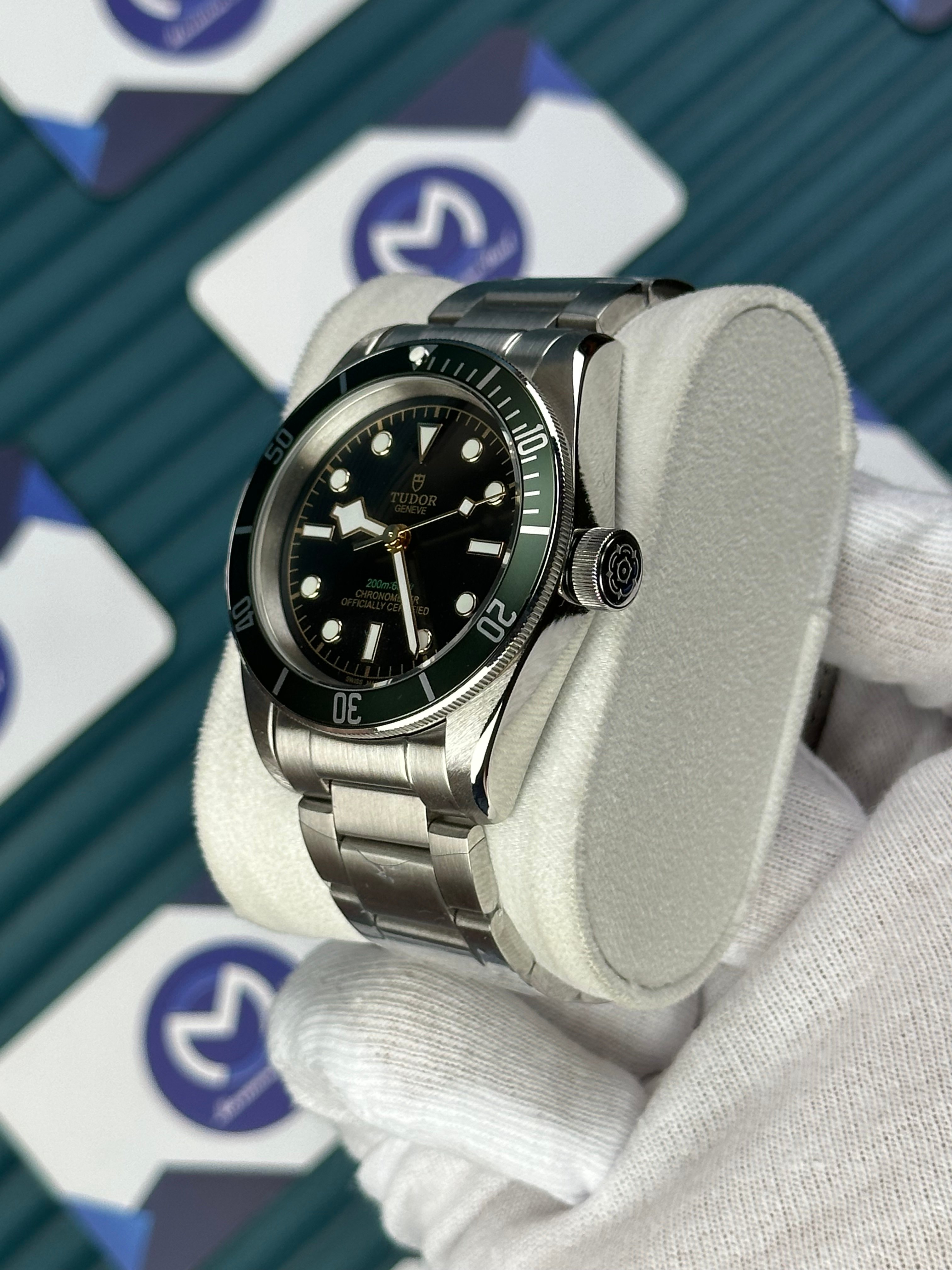 TUDOR BLACK DIAL GREEN BEZEL SILVER