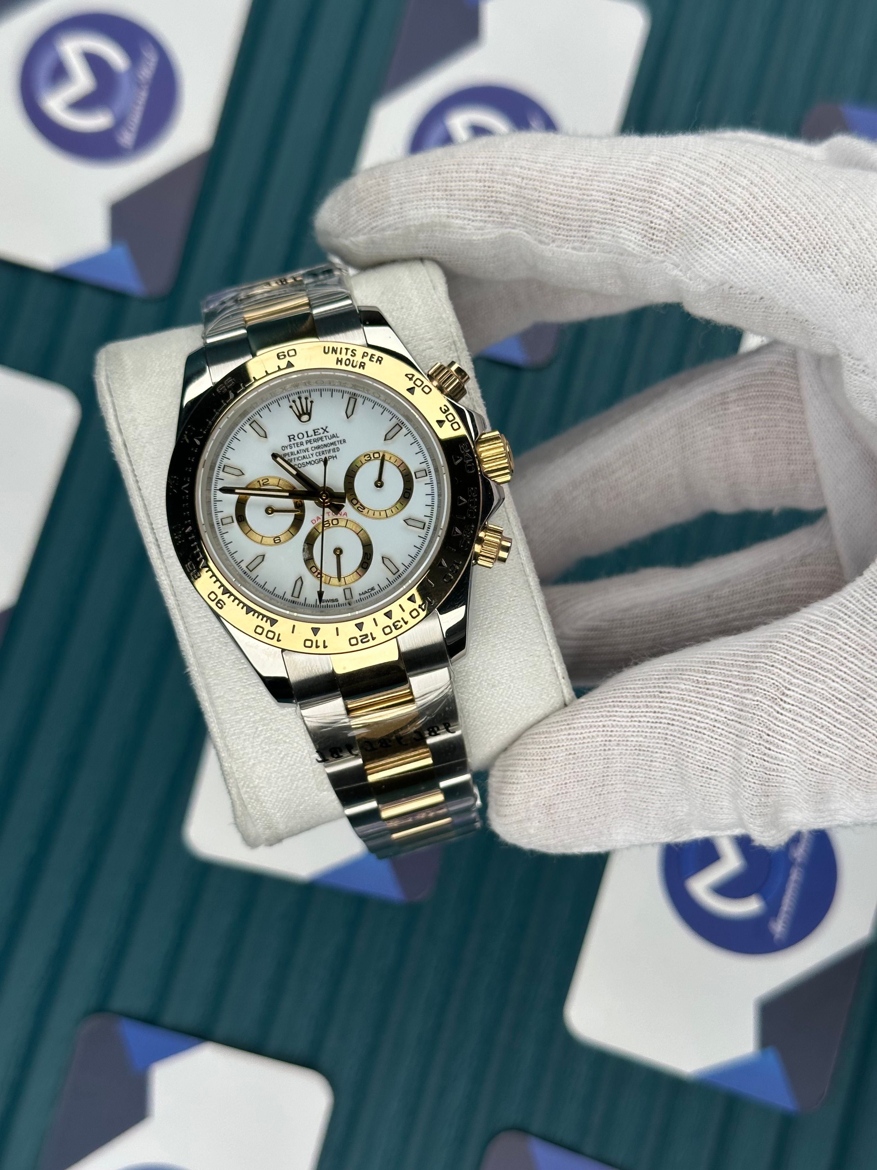 ROLEX DAYTONA WHITE DIAL GOLD BEZEL GOLD-SILVER OYSTER