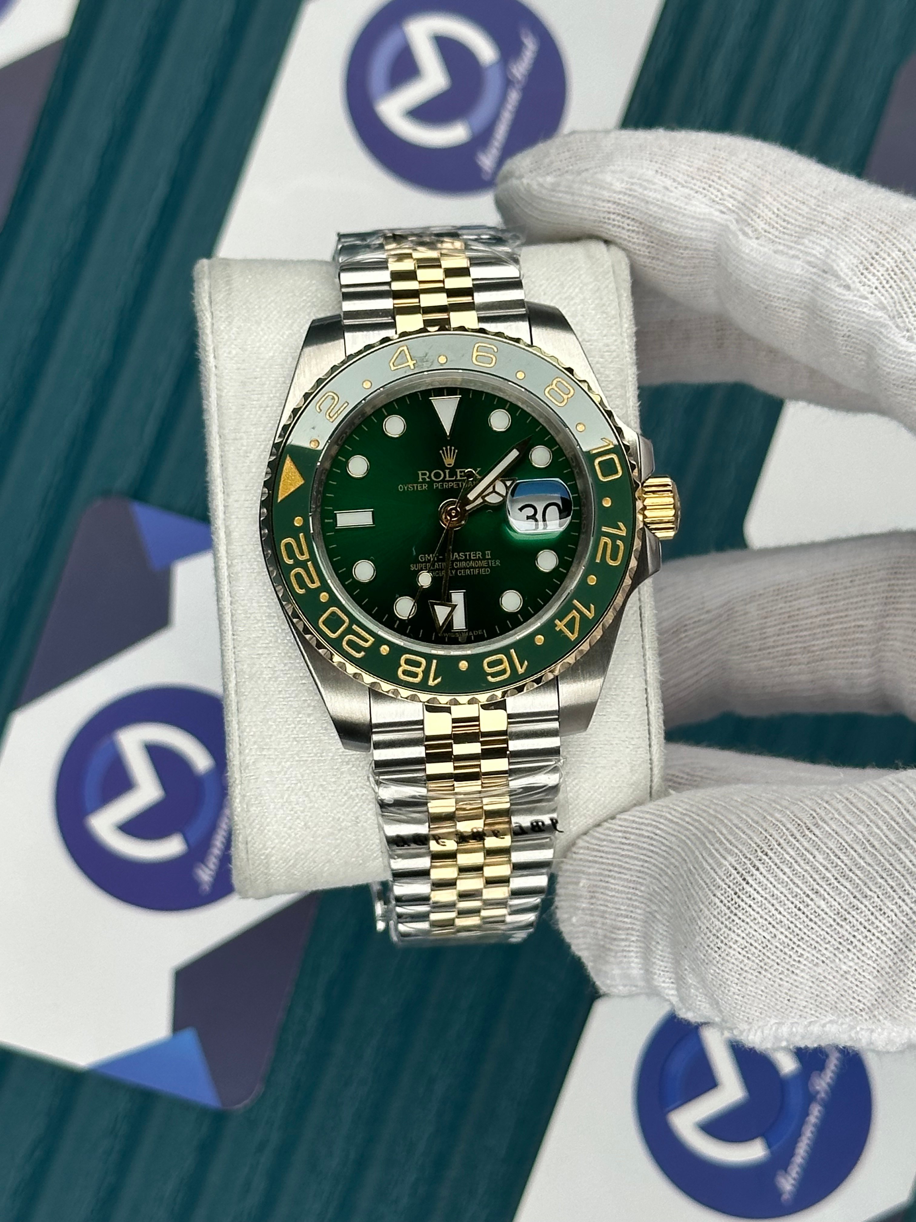 ROLEX GMT MASTER II GREEN DIAL AND BEZEL GOLD-SILVER JUBILE
