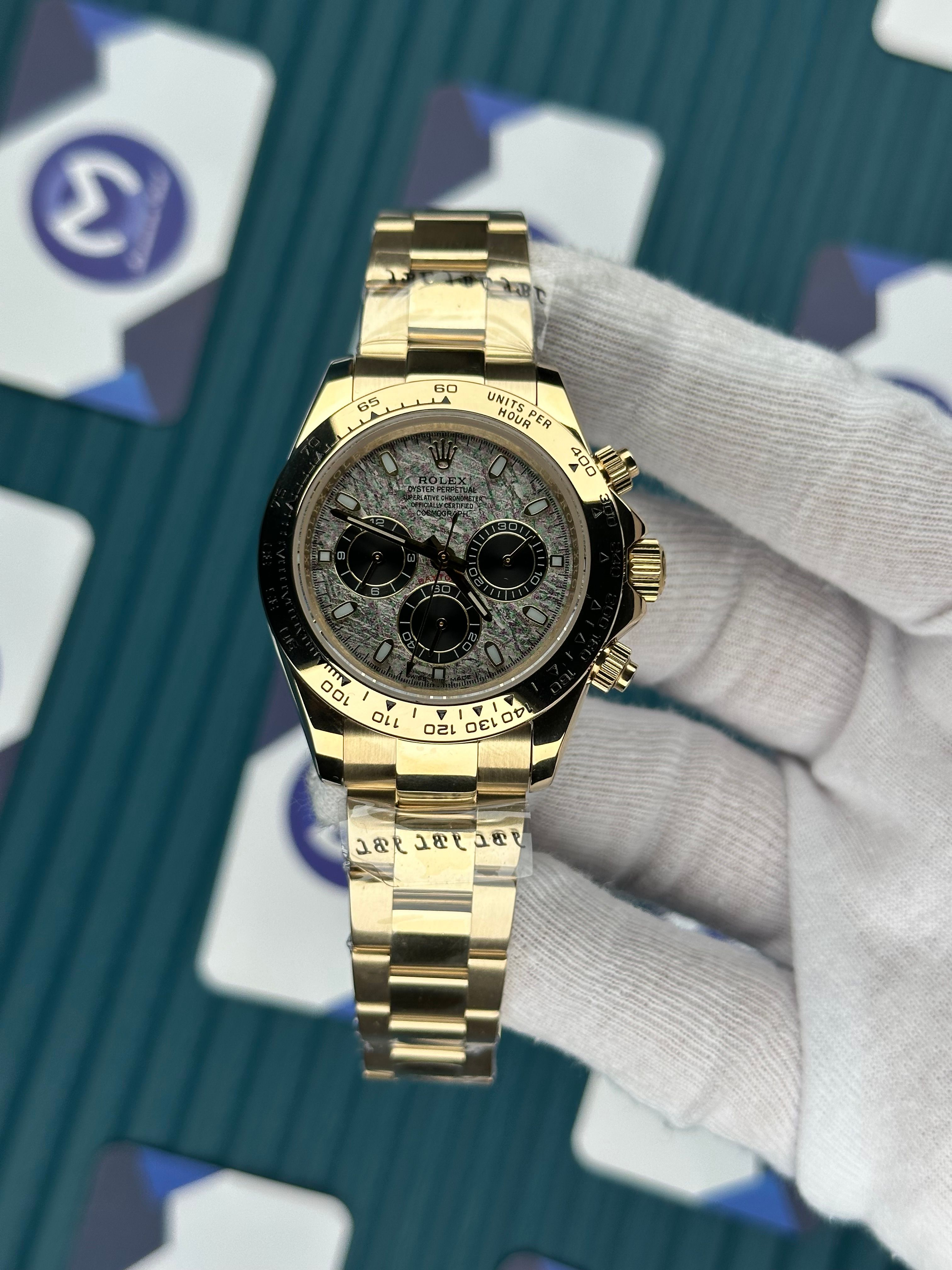 ROLEX DAYTONA GREY MOZAIK DIAL GOLD OYSTER