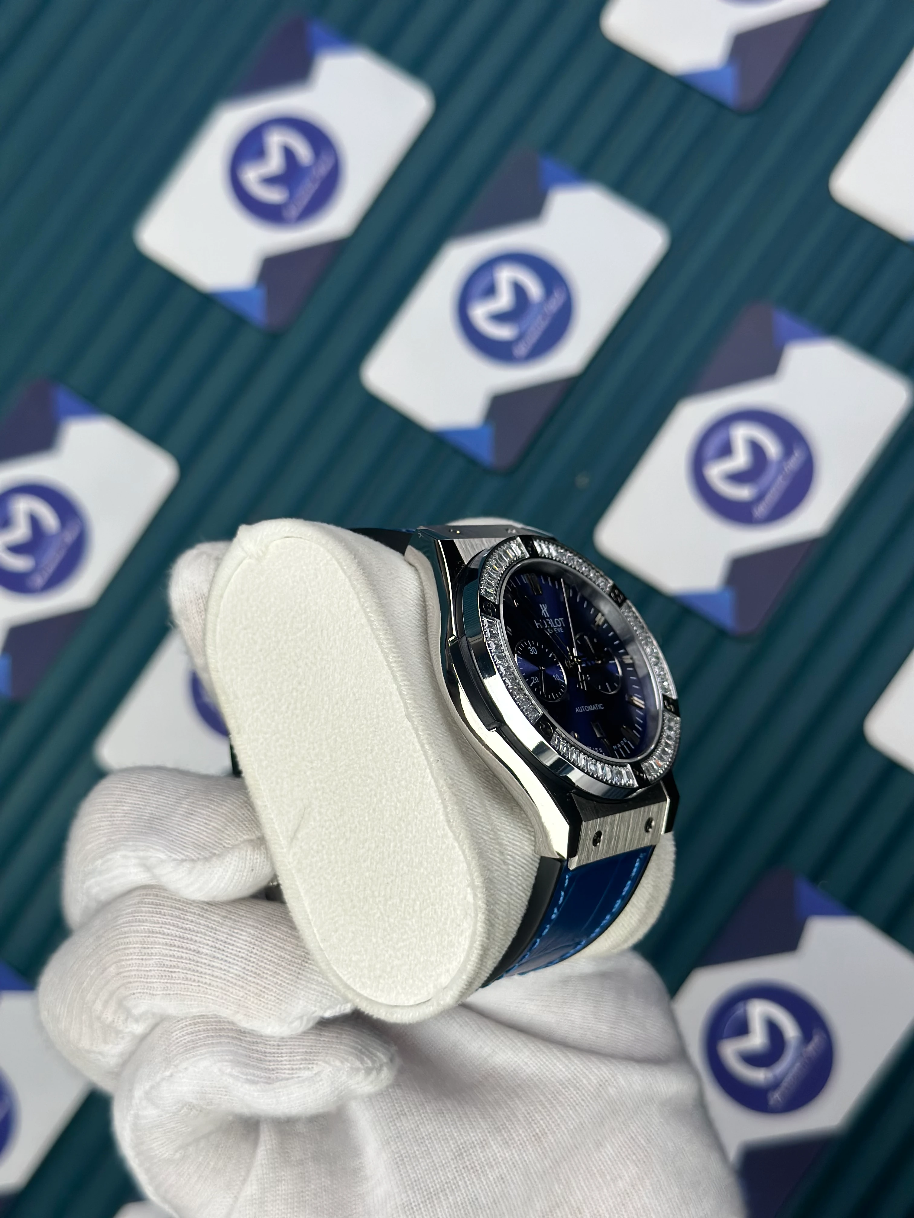 HUBLOT AUTOMATIC BLUE CHRONOGRAPH DIAL DIAMOND BEZEL SILVER CASE BLUE LEATHER CORD 