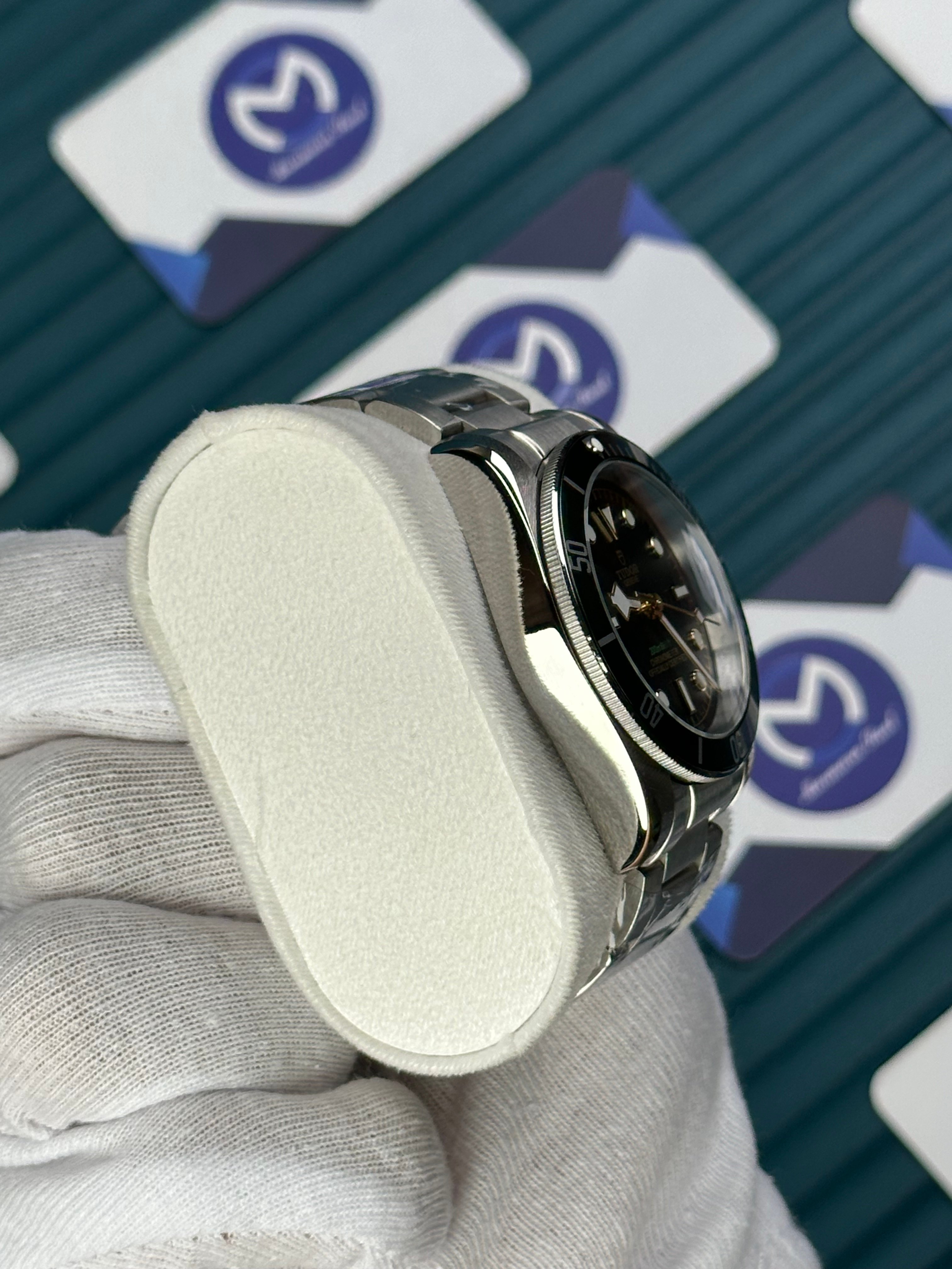 TUDOR BLACK DIAL GREEN BEZEL SILVER