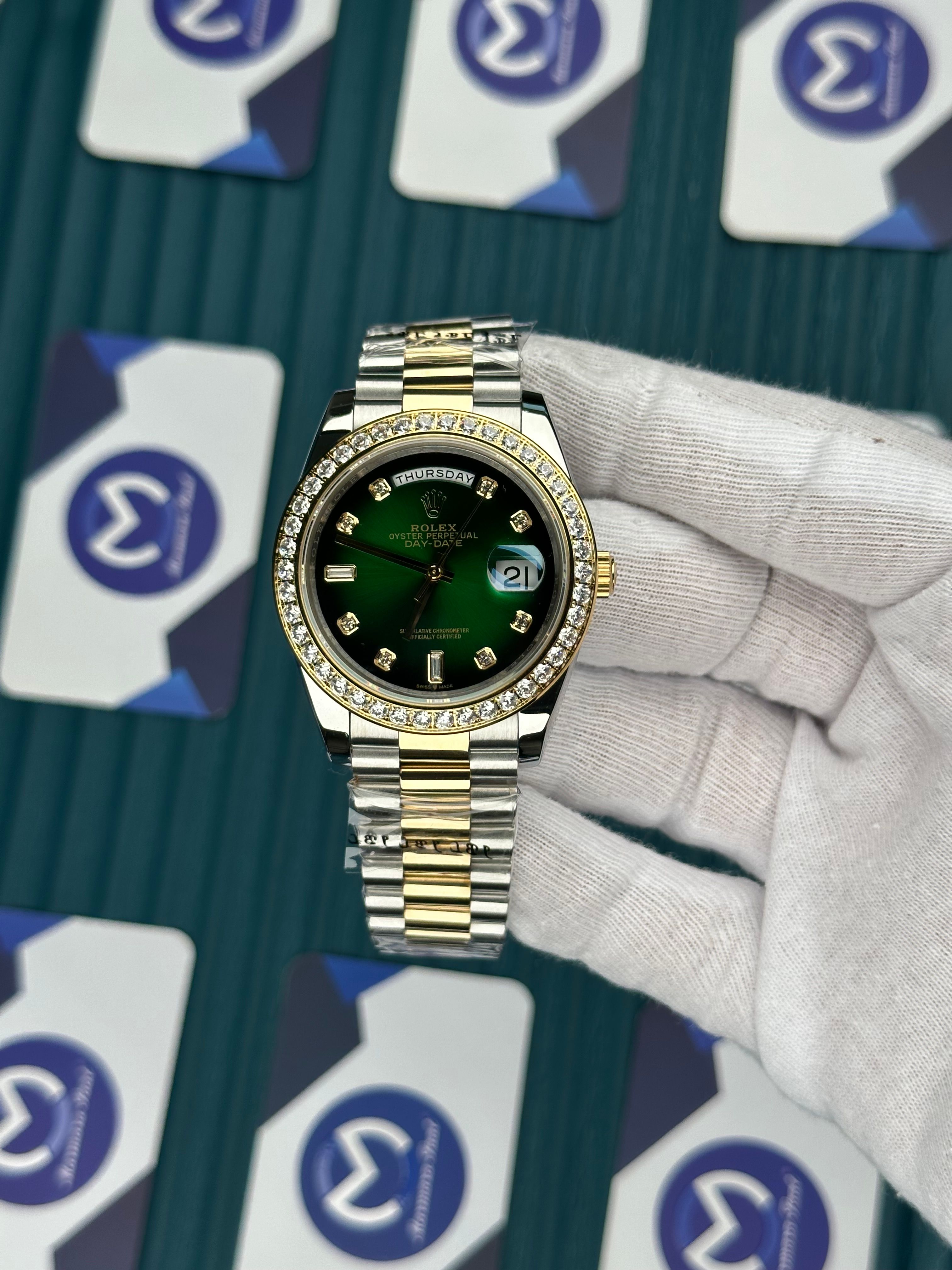 ROLEX DAY-DATE GREEN DIAL DIAMOND INDEX AND BEZEL GOLD-SILVER PRESIDENT