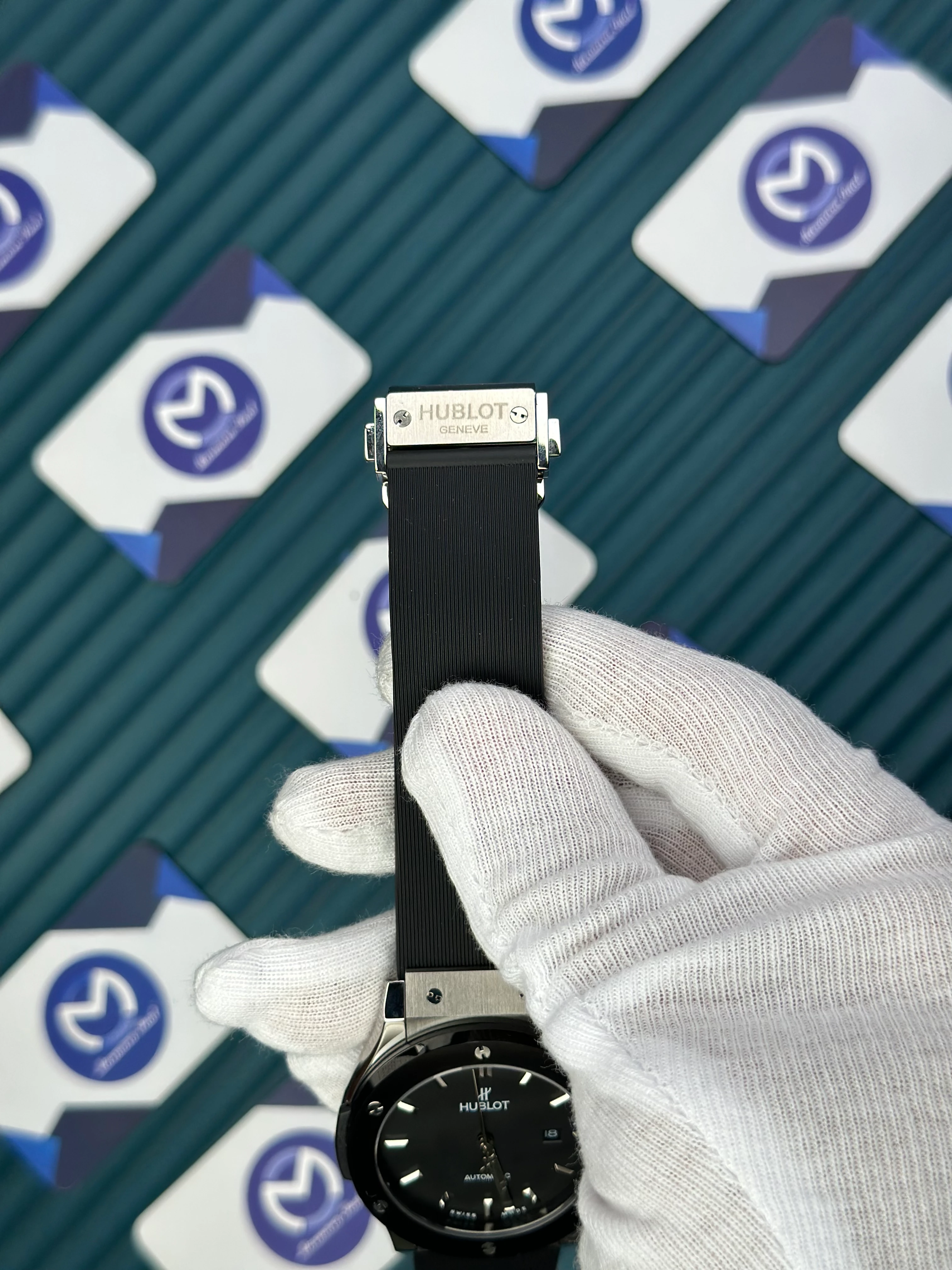 HUBLOT GENEVE AUTOMATIC VENDOME BLACK DIAL SILVER CASE BLACK BEZEL BLACK RUBBER CORD 