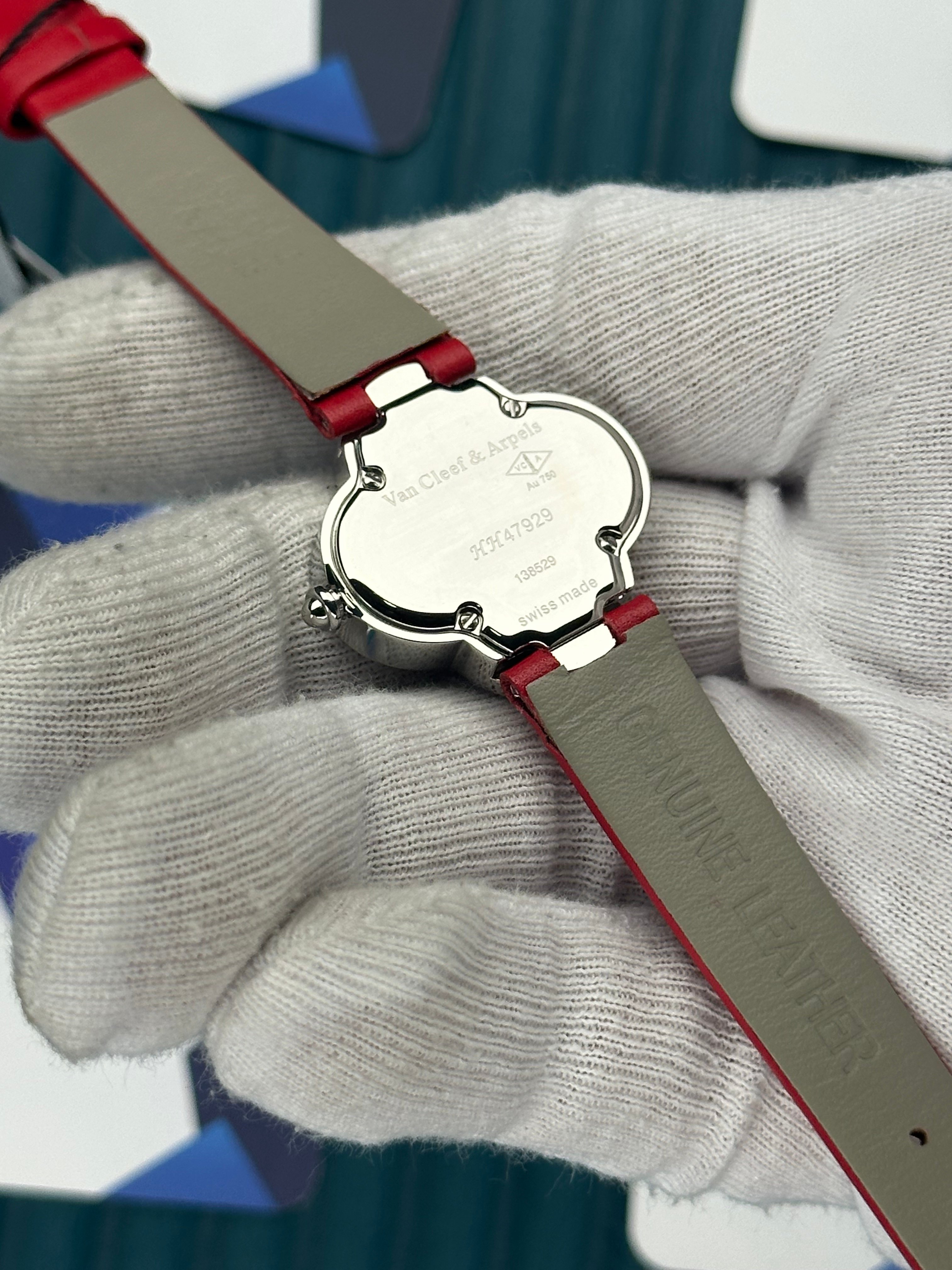 VAN CLEEF & ARPELS RED DIAL DIAMOND BEZEL SILVER CASE RED LEATHER CORD