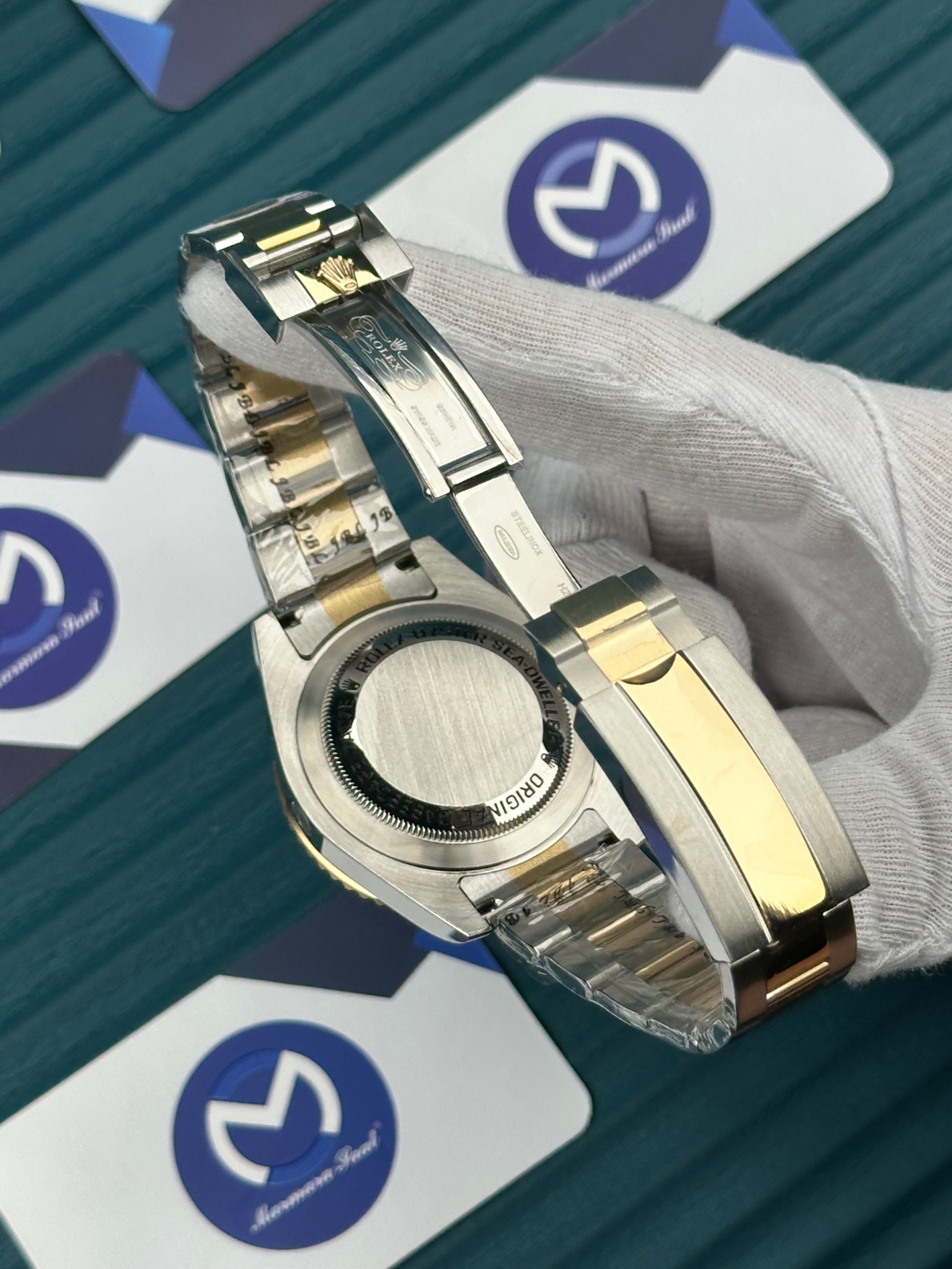 ROLEX SEA DWELLER BLACK DIAL GOLD-SILVER OYSTER