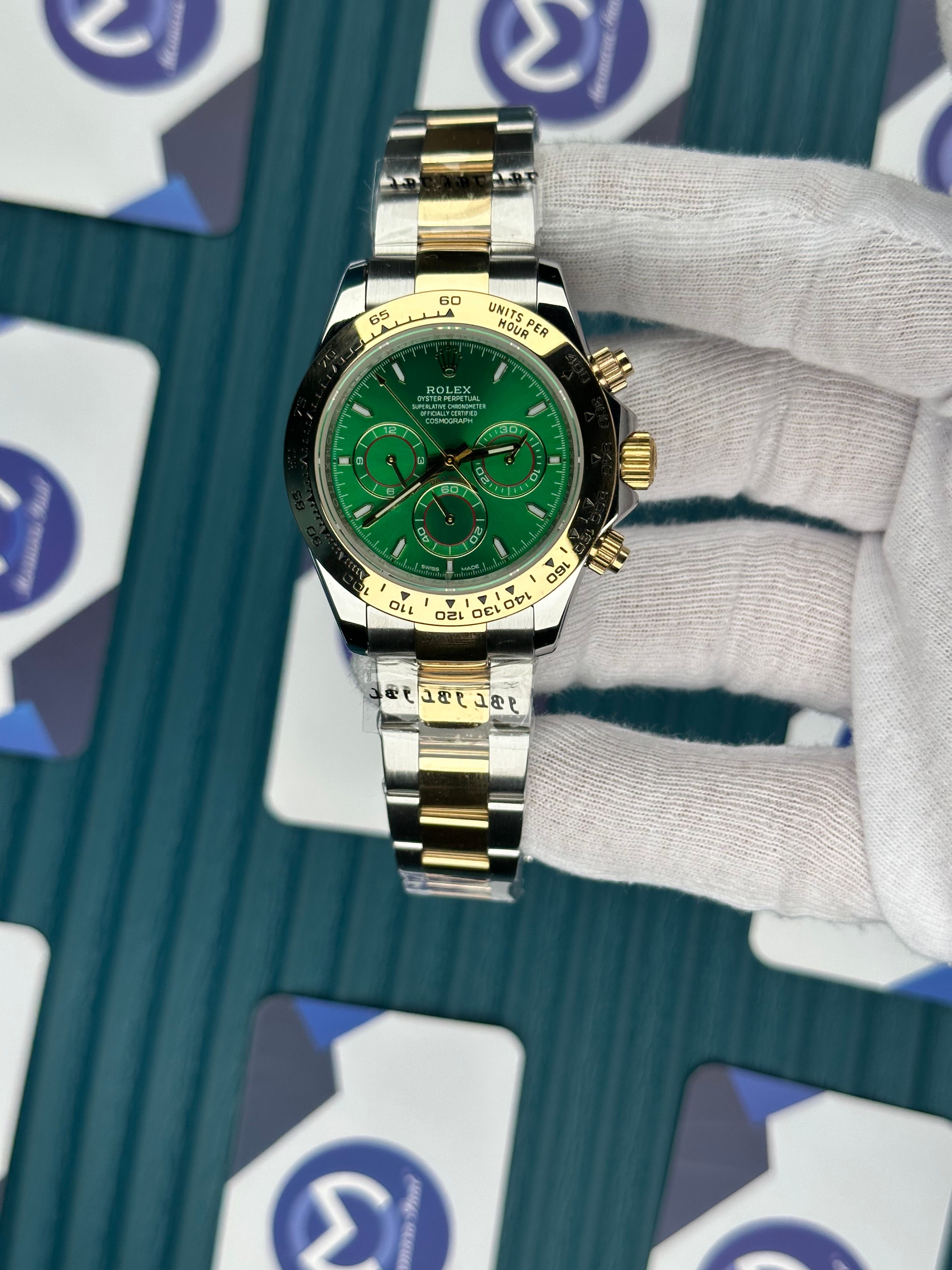 ROLEX DAYTONA GREEN DIAL GOLD-SILVER OYSTER
