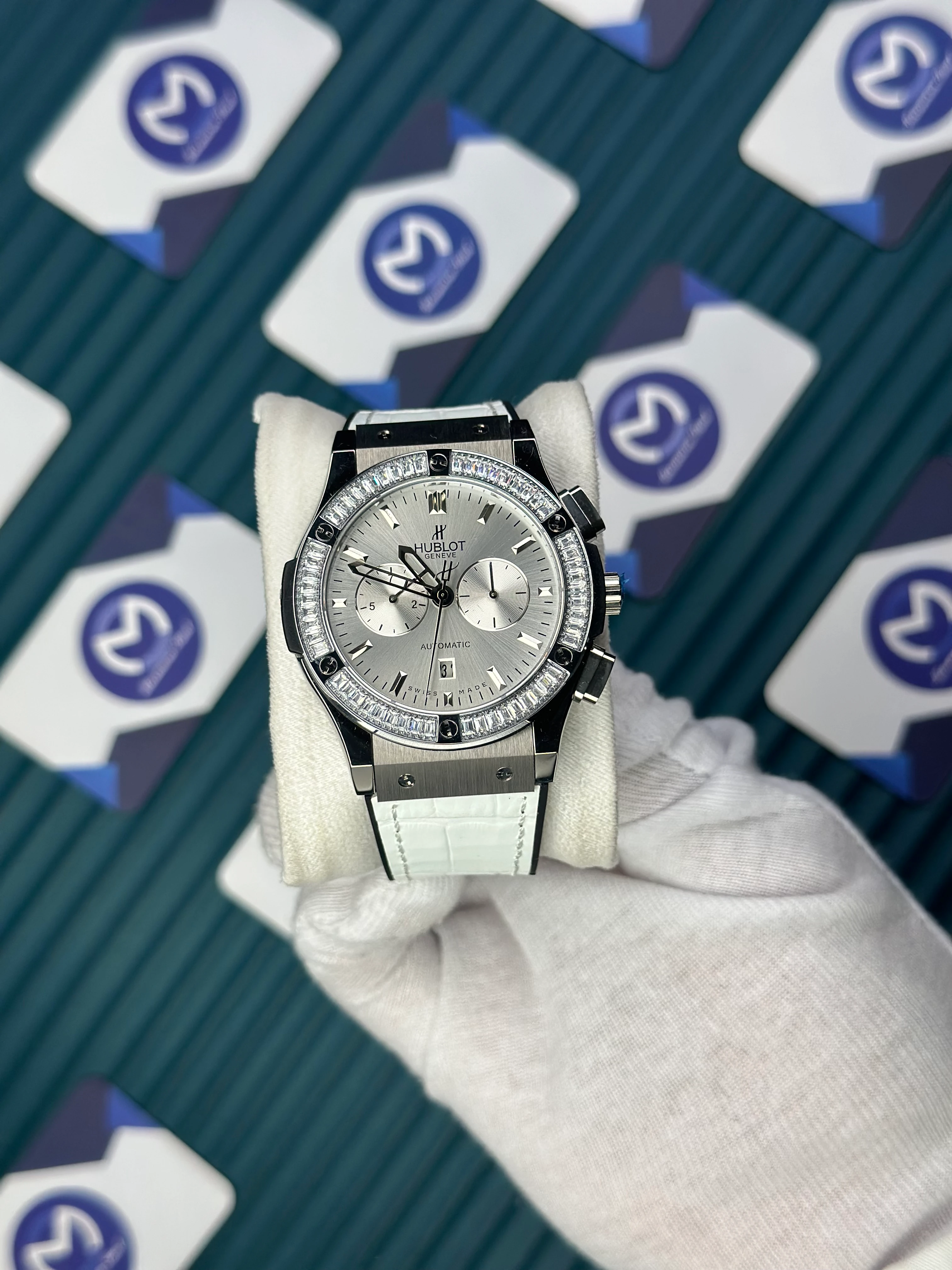 HUBLOT AUTOMATIC WHITE CHRONOGRAPH DIAL DIAMOND BEZEL WHITE LEATHER CORD 