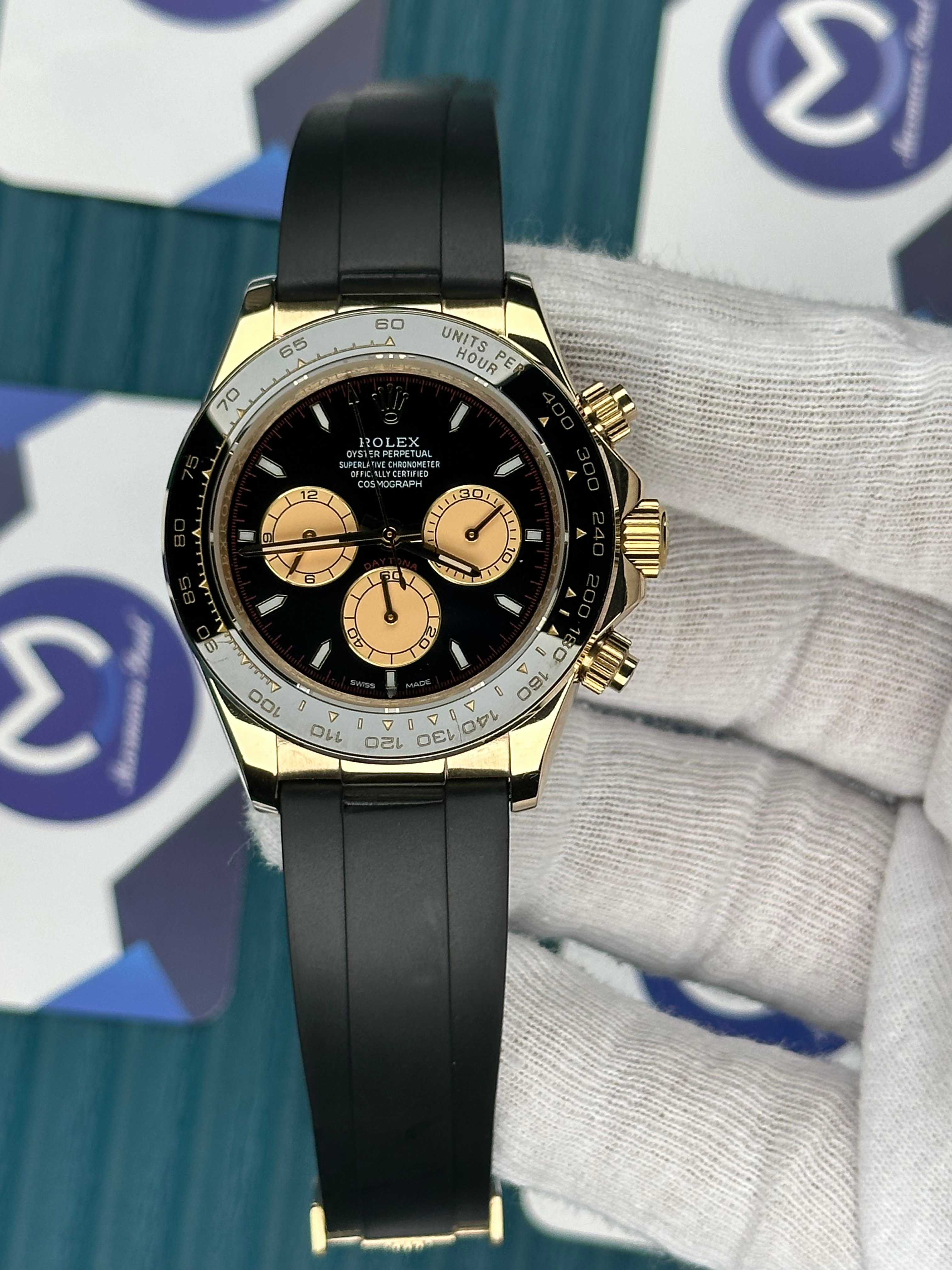 ROLEX DAYTONA BLACK DIAL GOLD CHRONOGAPH GOLD CASE OYSTERFLEX
