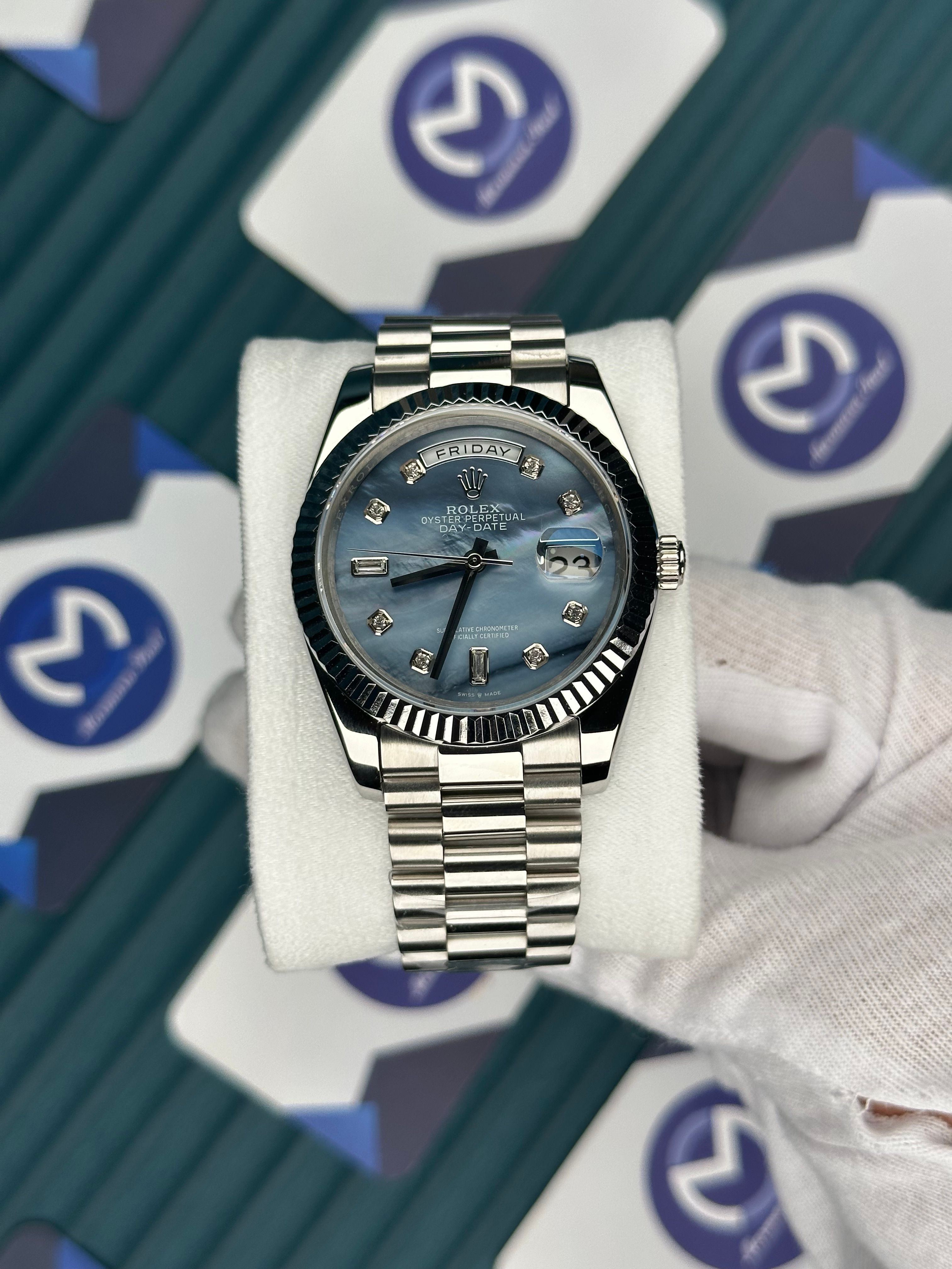 ROLEX DAY-DATE PATTERNED BLUE DIAL DIAMOND INDEX SILVER PRESIDENT