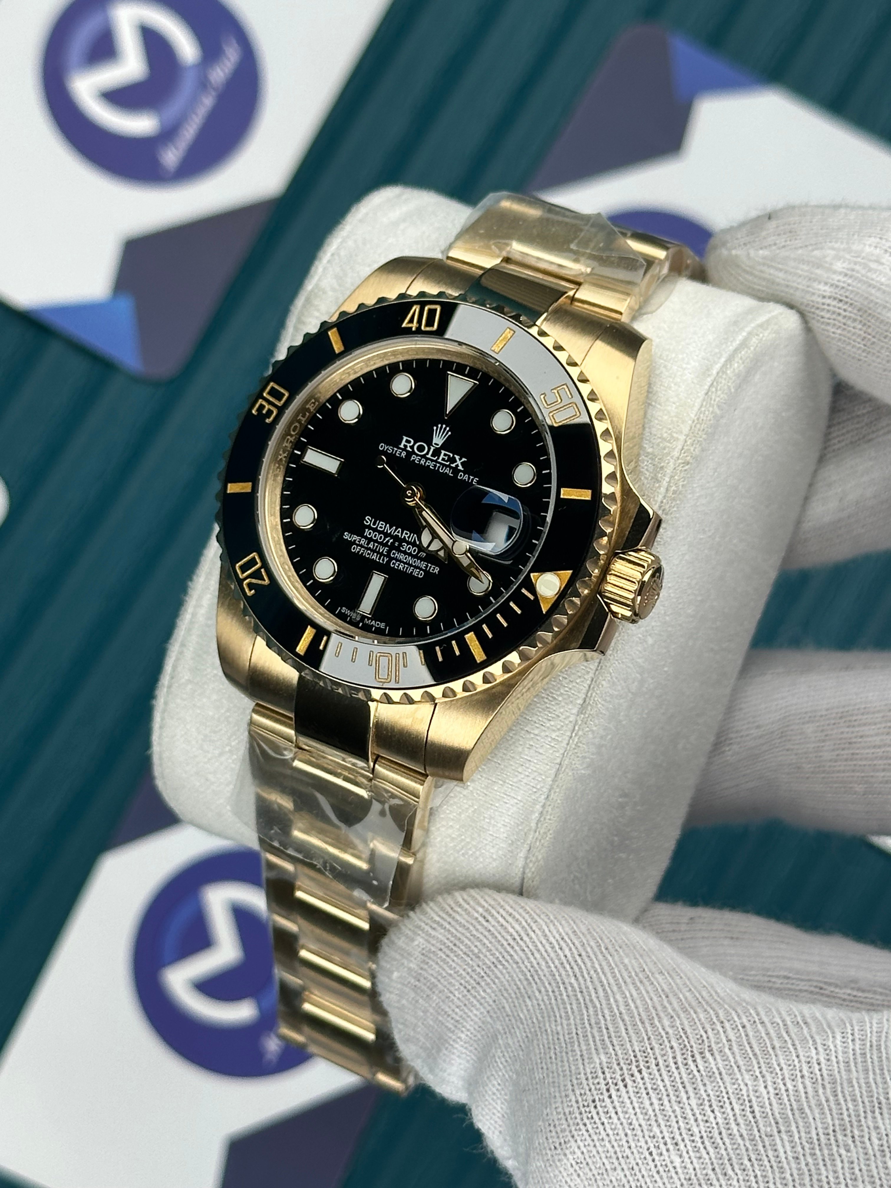 ROLEX SUBMARINER NLACK DIAL GOLD OYSTER