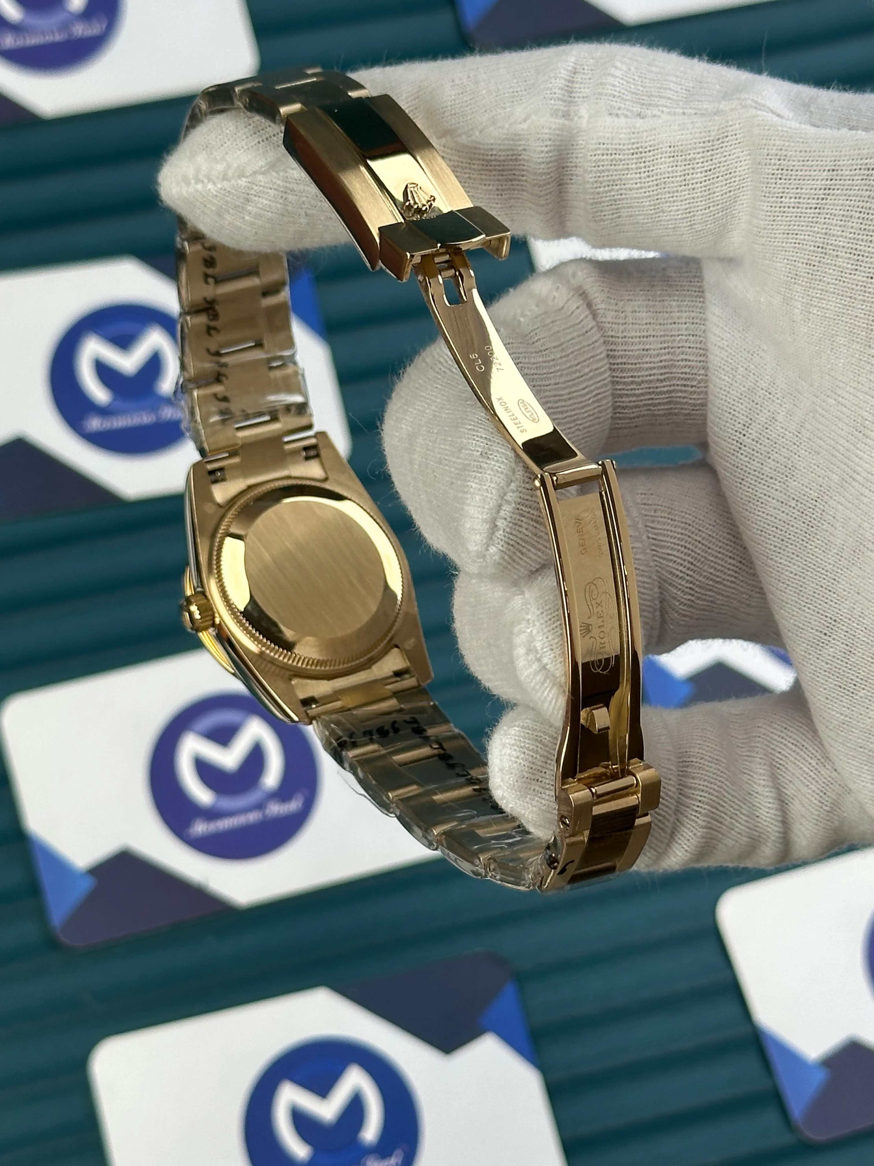 ROLEX 31 MM DATEJUST BLUE DIAL DIAMOND INDEX GOLD OYSTER 