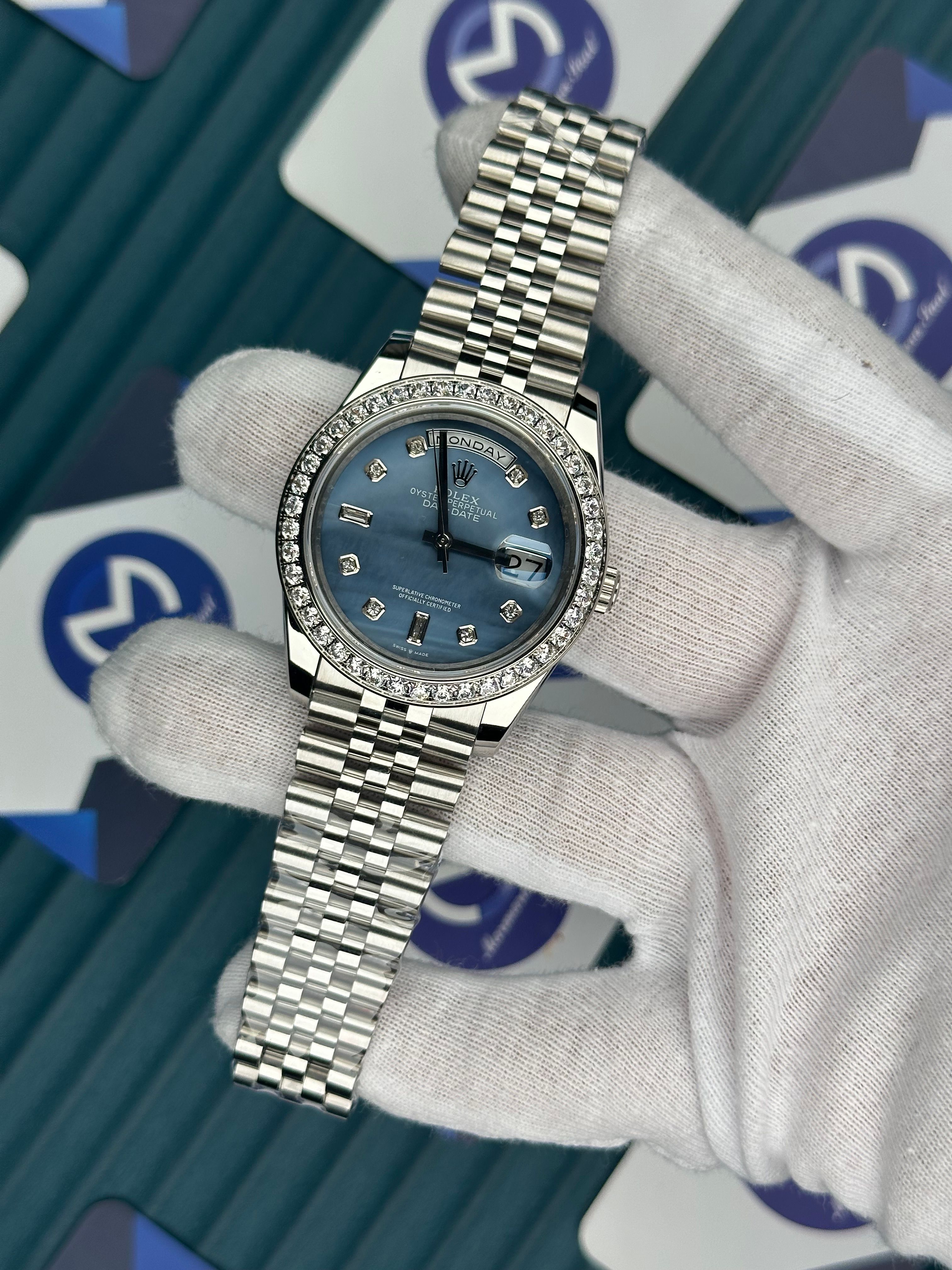 ROLEX DAY-DATE PATTERNED BLUE DIAMOND BEZEL AND INDEX SILVER JUBILE