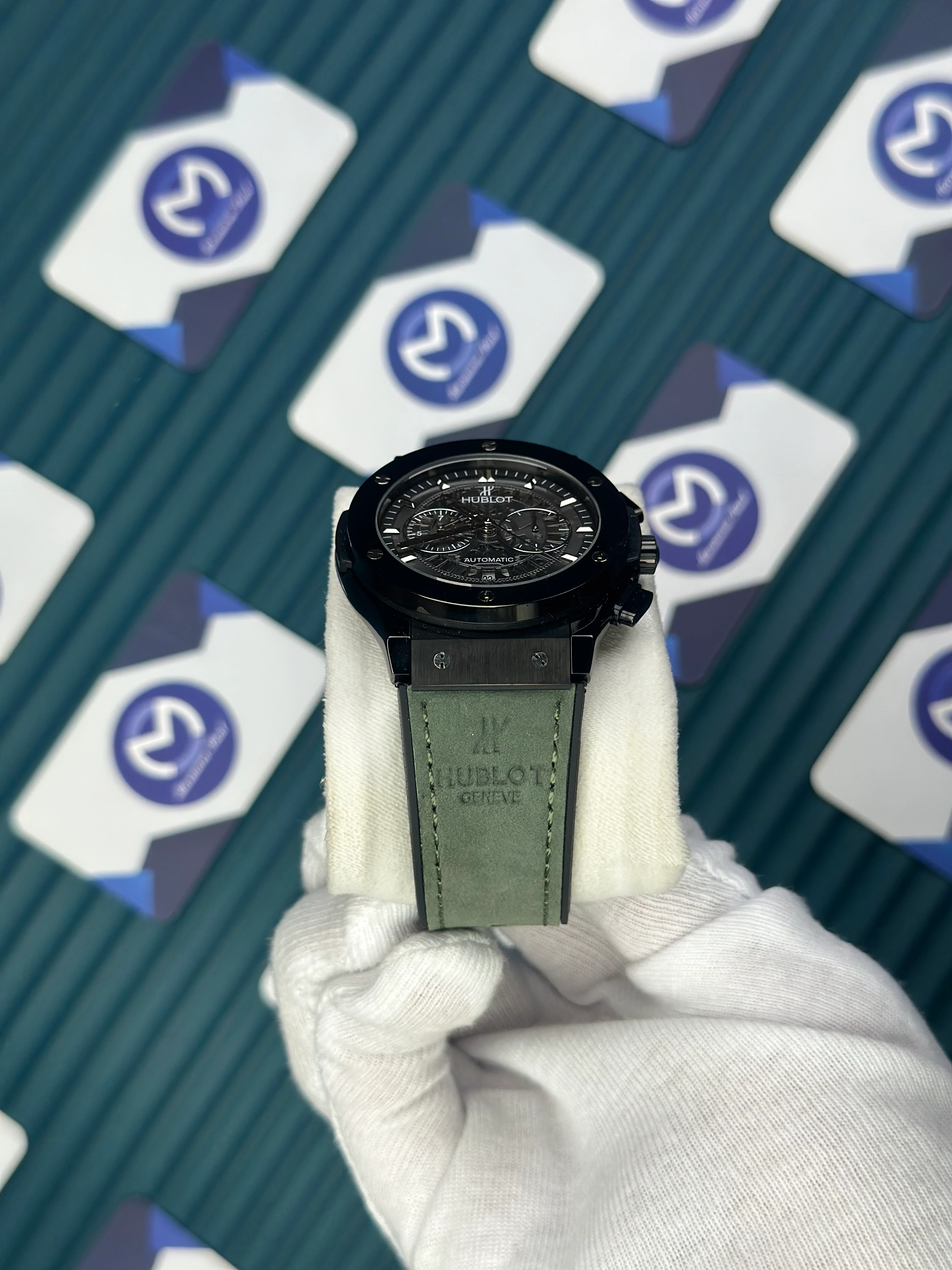 HUBLOT AUTOMATIC SKELETON DIAL BLACK CASE GREEN LEATHER CORD 