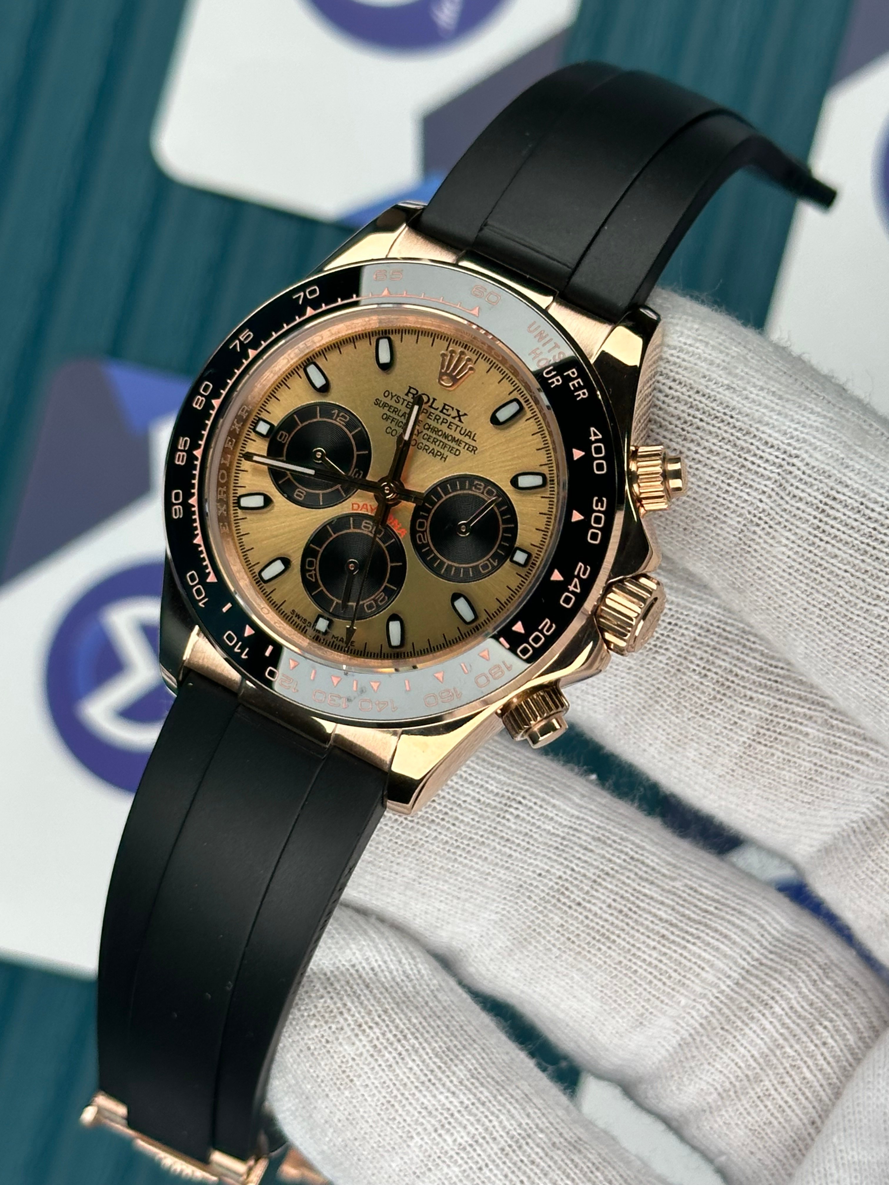 ROLEX DAYTONA CHAMPAGNE DIAL ROSE CASE OYSTERFLEX