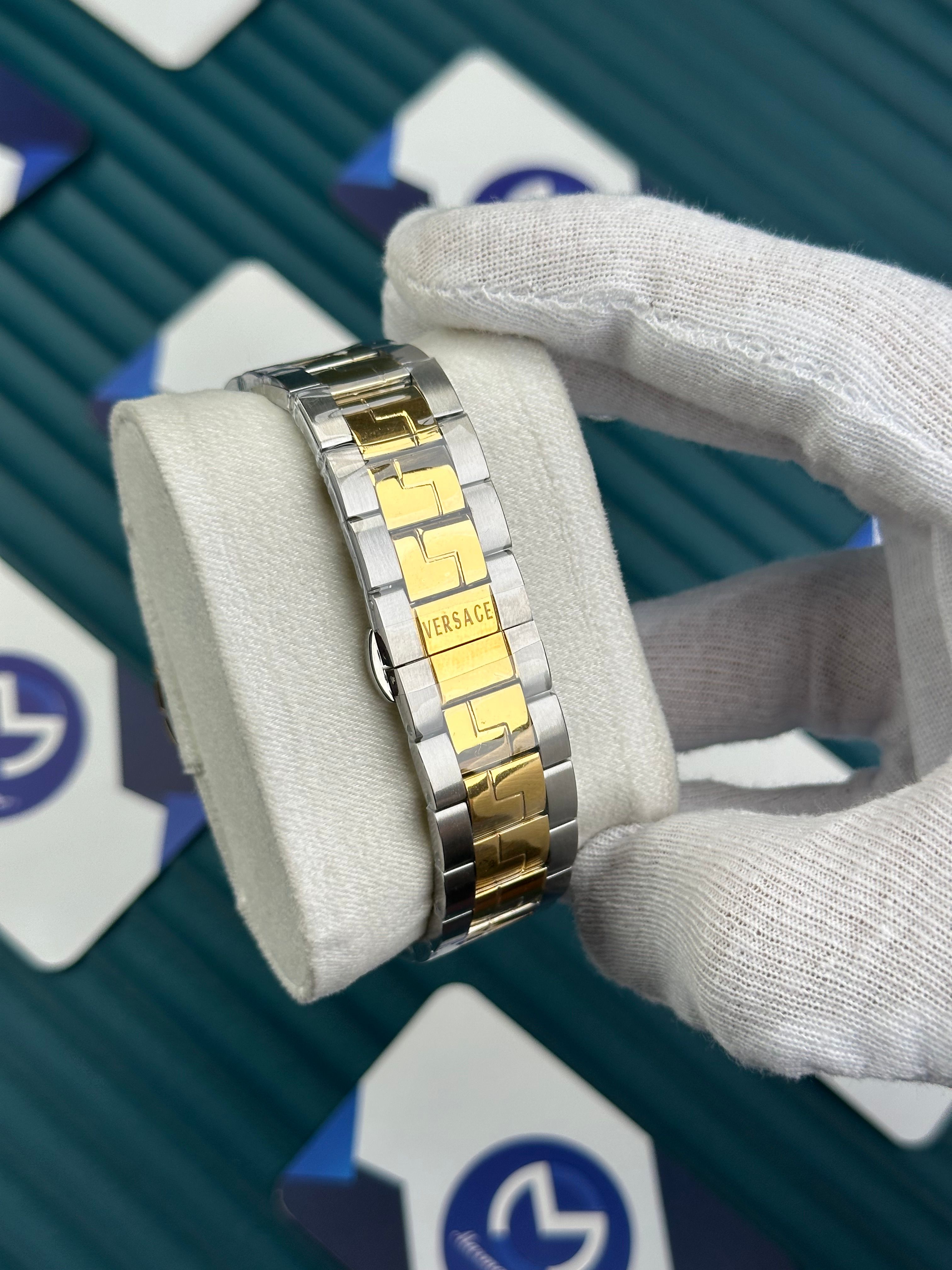 VERSACE BLUE DIAL AND BEZEL GOLD SILVER 