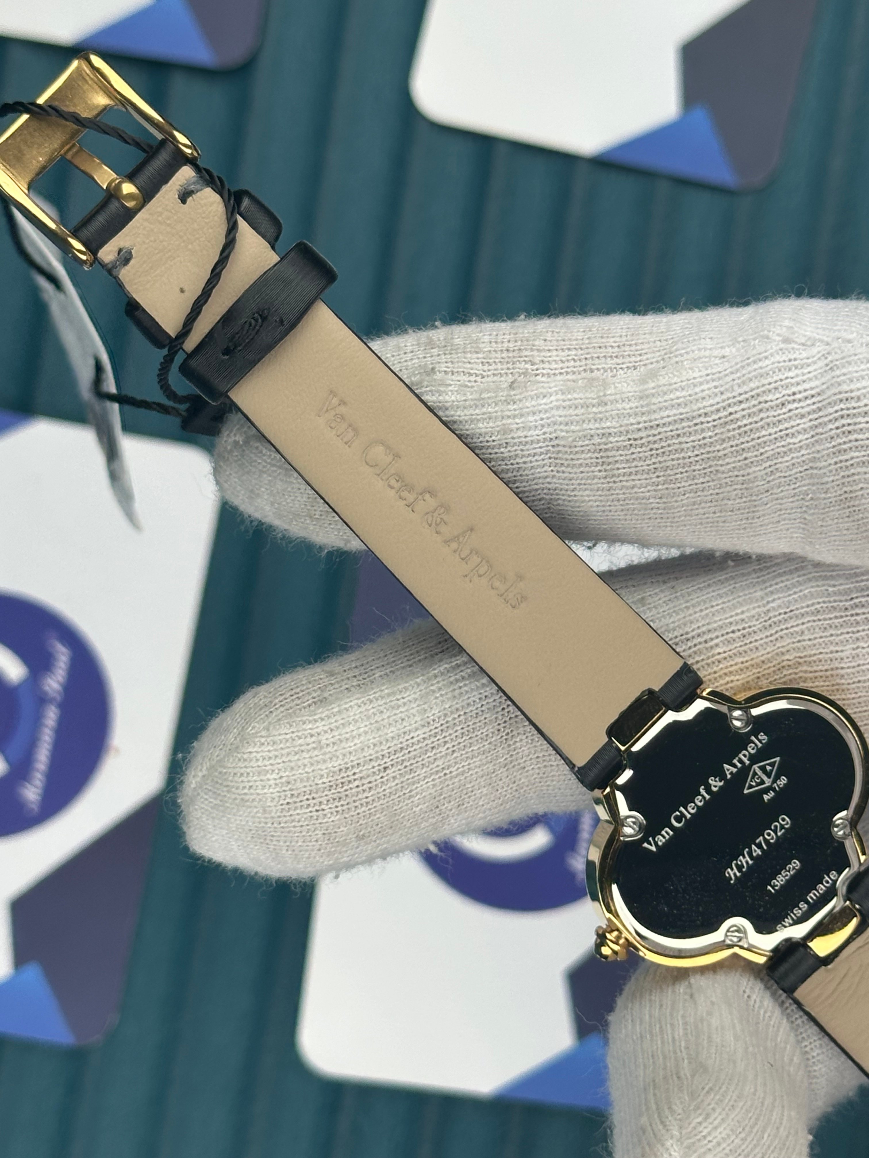 VAN CLEEF & ARPELS WHITE DIAL GOLD CASE BLACK LEATHER CORD