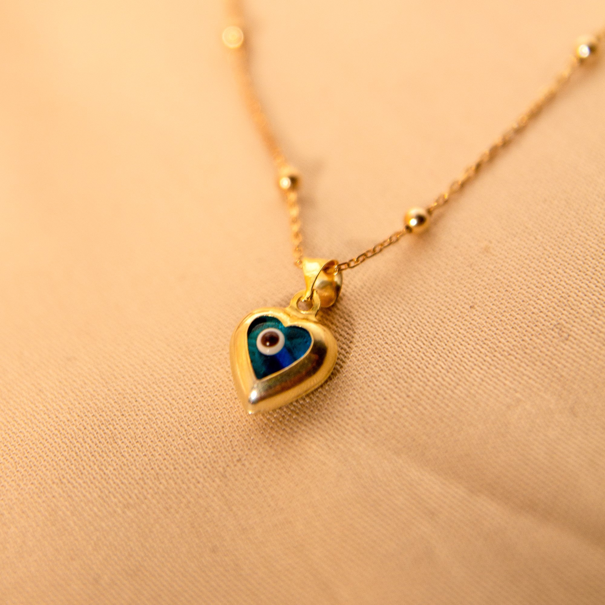 Blue Evil Eye Sapphire Heart Necklace