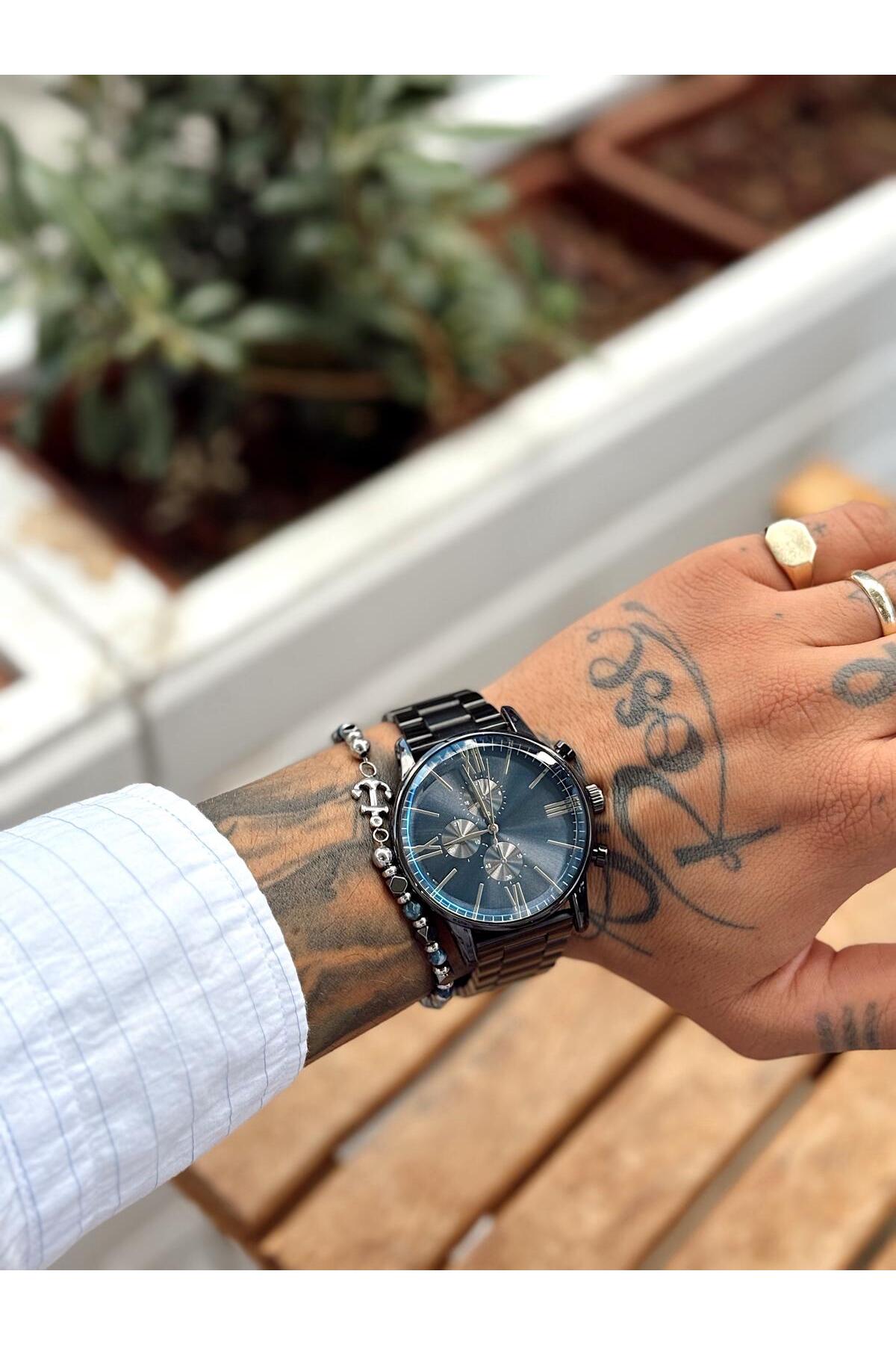 Siyah Kadranlı, Siyah Metal Kordonlu, Kronograf Detaylı ve Roma Rakamlı Erkek Kol Saati