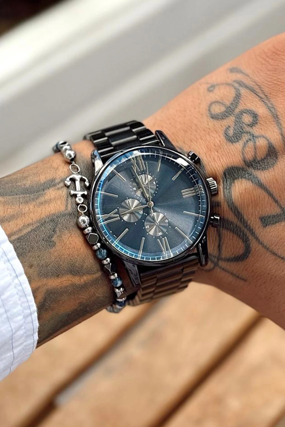 Siyah Kadranlı, Siyah Metal Kordonlu, Kronograf Detaylı ve Roma Rakamlı Erkek Kol Saati