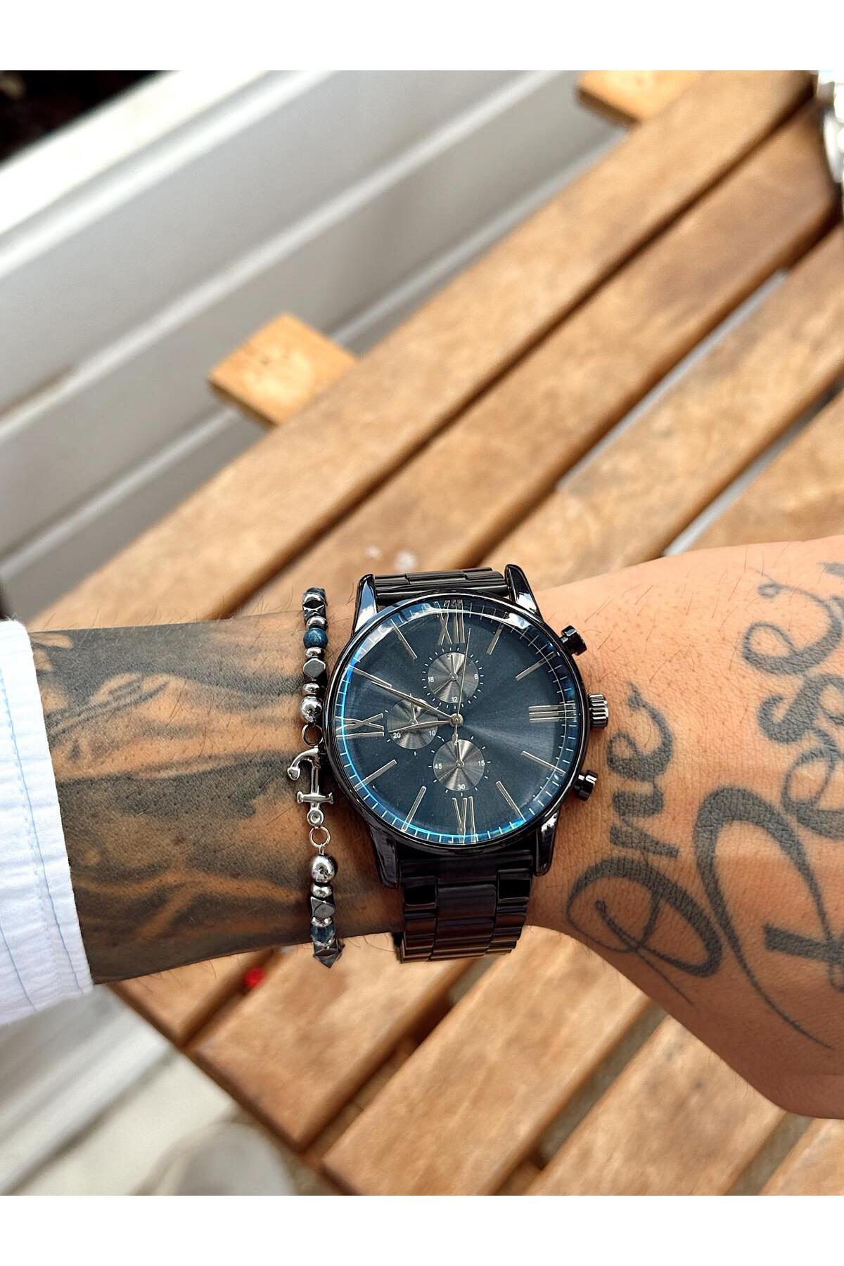 Siyah Kadranlı, Siyah Metal Kordonlu, Kronograf Detaylı ve Roma Rakamlı Erkek Kol Saati