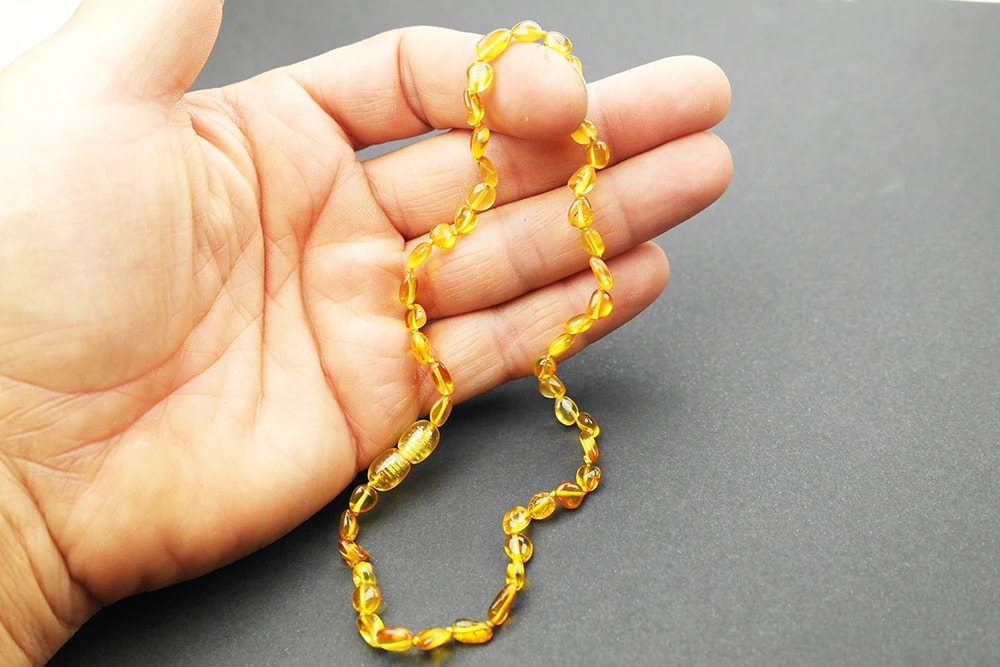 Bal Renkli Damla Kehribar Bebek Kolye