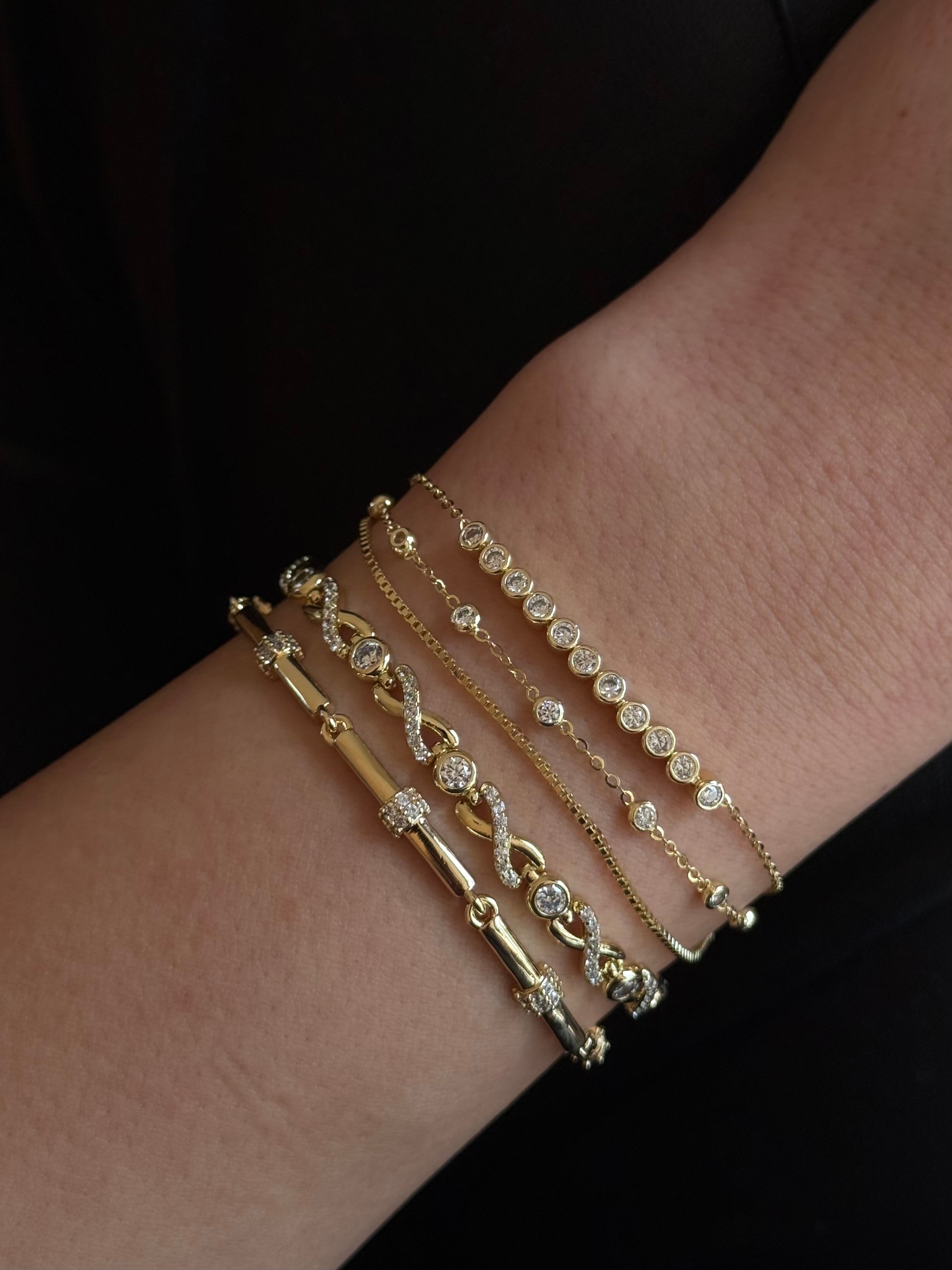 Gold Rengi Yuvarlak Taş Detaylı Sonsuzluk Model Xupıng Kadın Bileklik