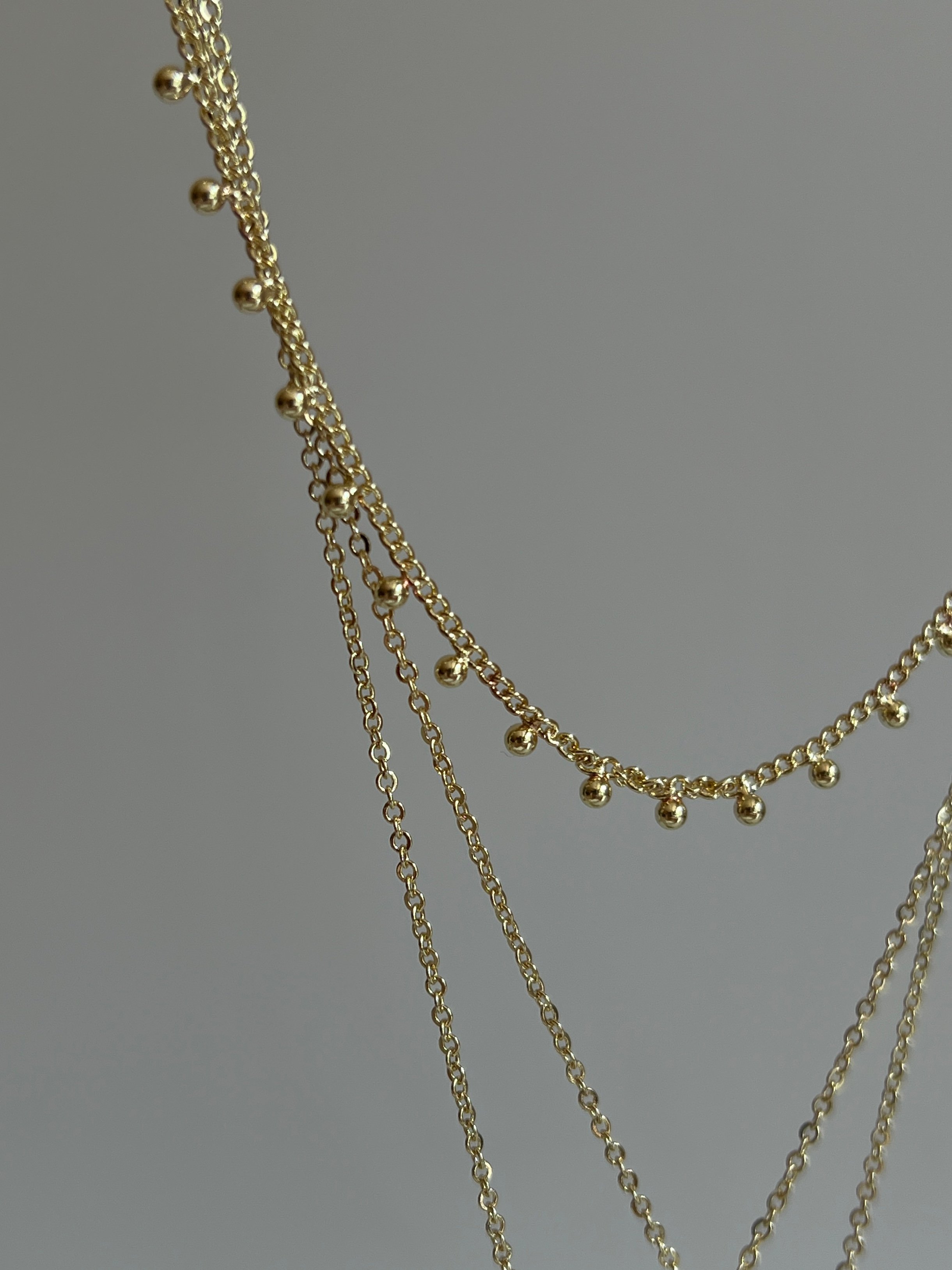 Gold Rengi Zirkon Taş Detaylı Yıldız Model Üç Sıra Kadın Kolye